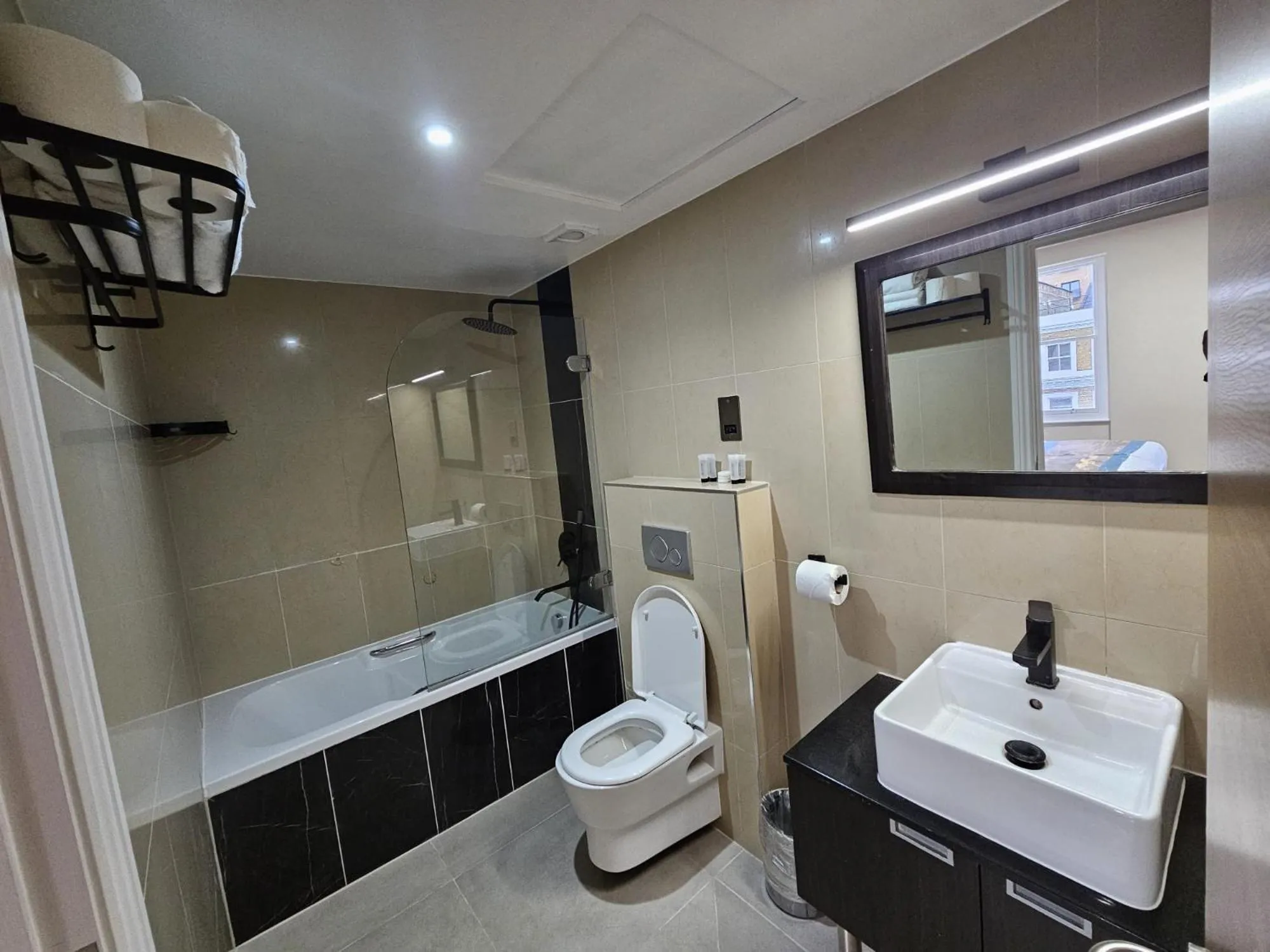 Toilet in Cromwell Hotel