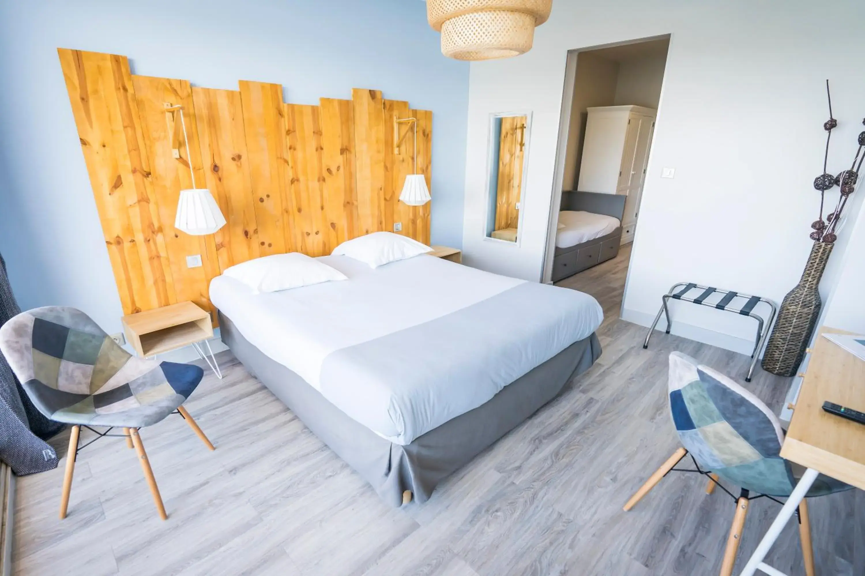 Superior Triple Room with Balcony and Lake View in Le Relais Du Lac Superior Triple Room with Balcony and Lake View in Le Relais Du Lac