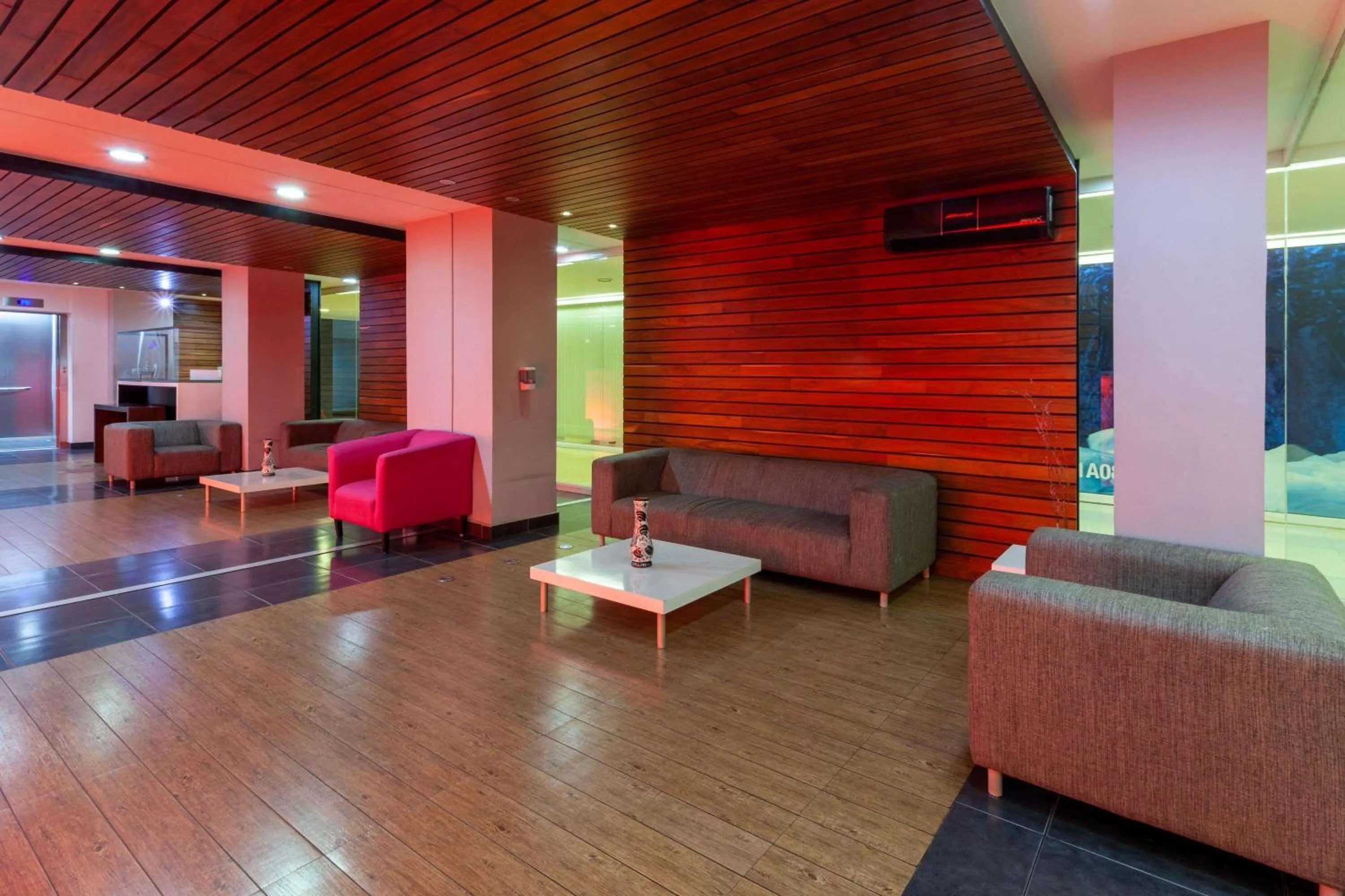 Lobby or reception in Ramada by Wyndham Acapulco Hotel & Suites