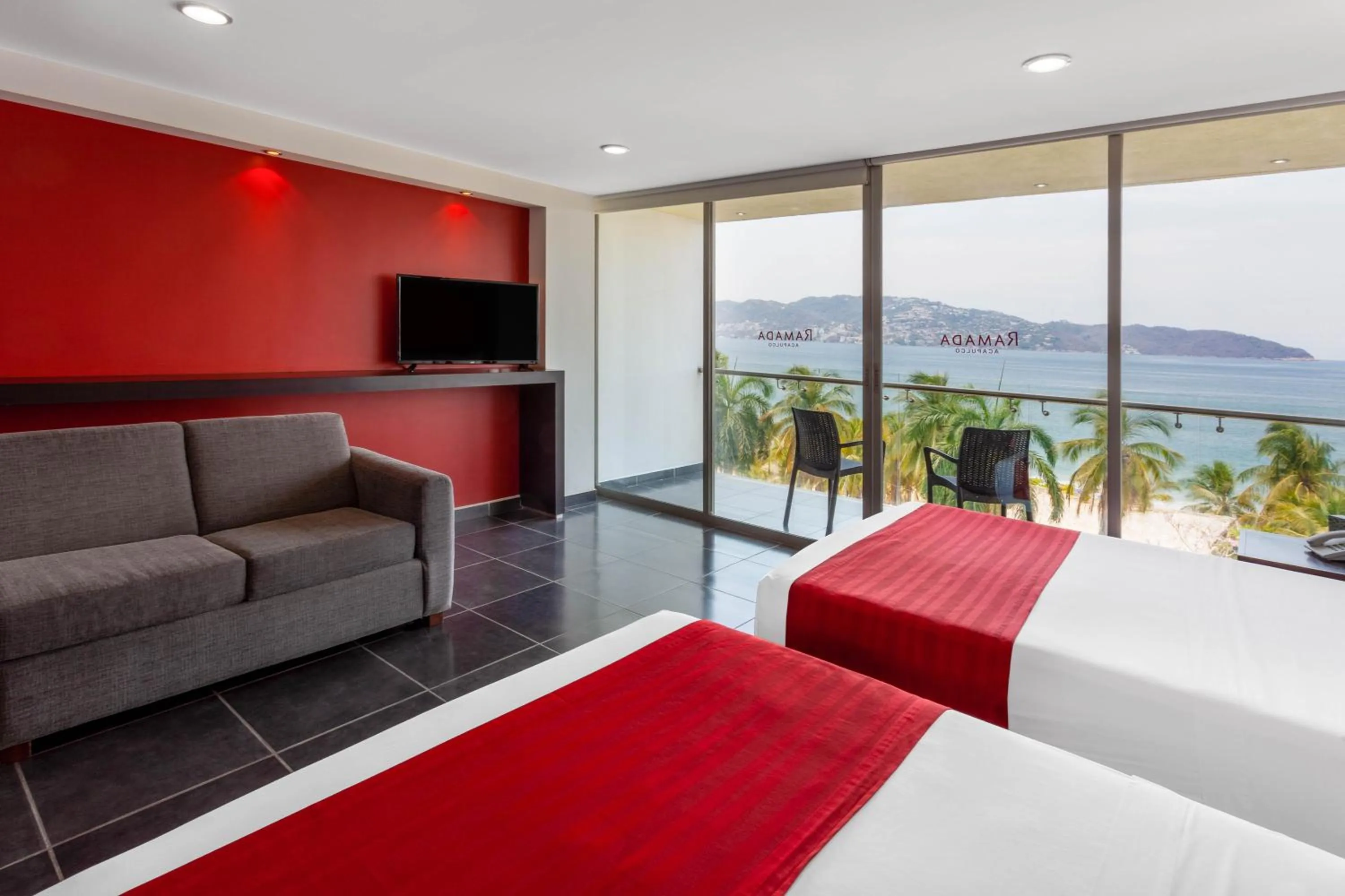 Bedroom, Bed in Ramada by Wyndham Acapulco Hotel & Suites