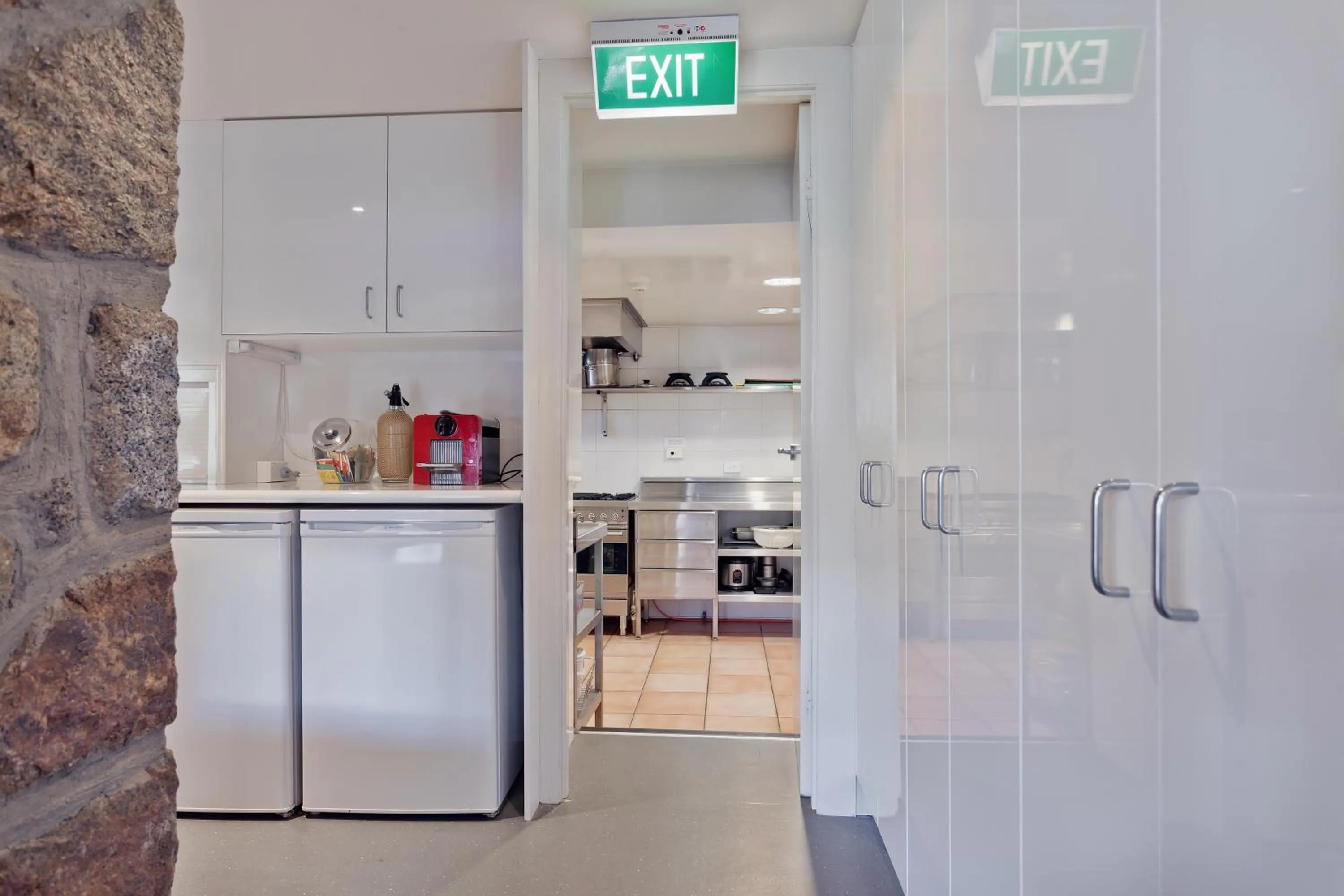 Communal kitchen in Pure Chalet Thredbo