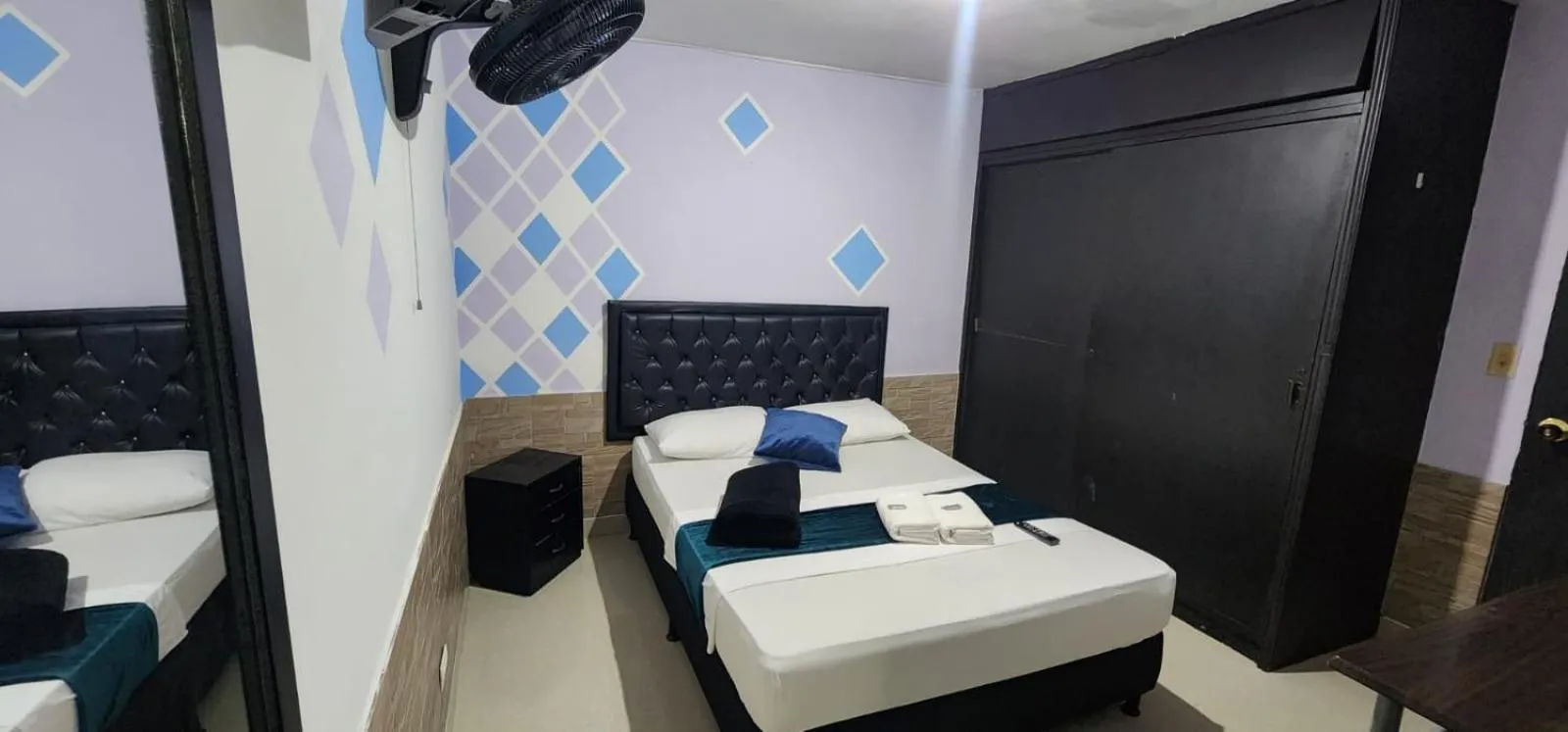 Bed in hotel medellin calasanz