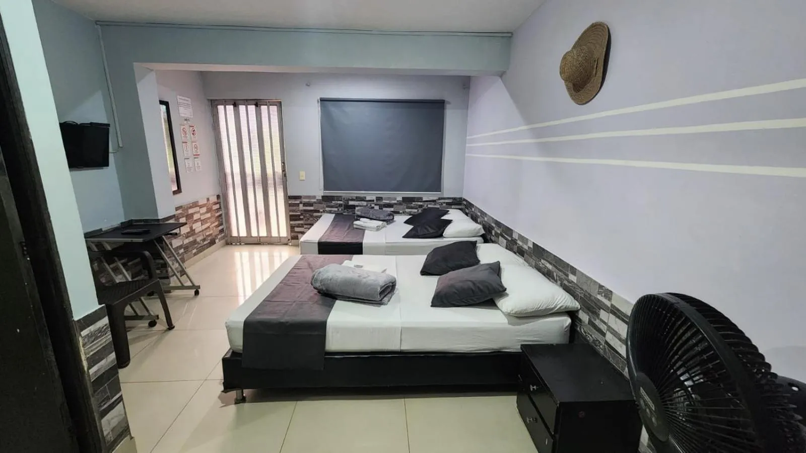 Bed in hotel medellin calasanz