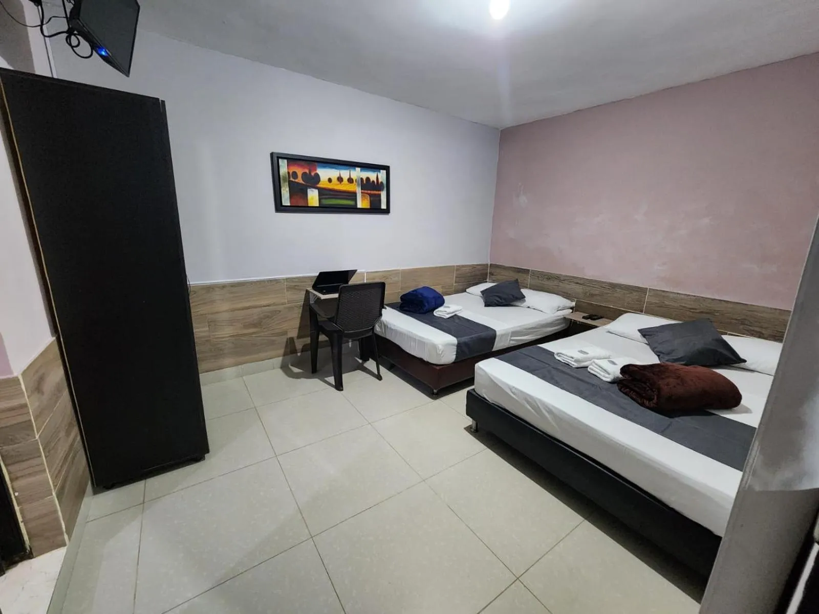 Bed in hotel medellin calasanz