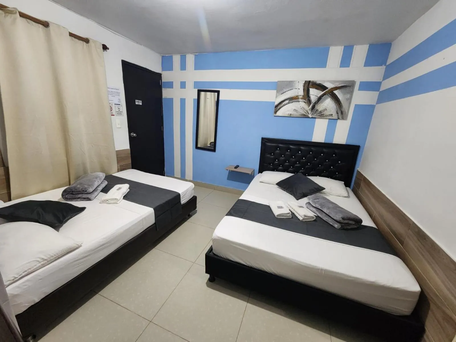 Bed in hotel medellin calasanz
