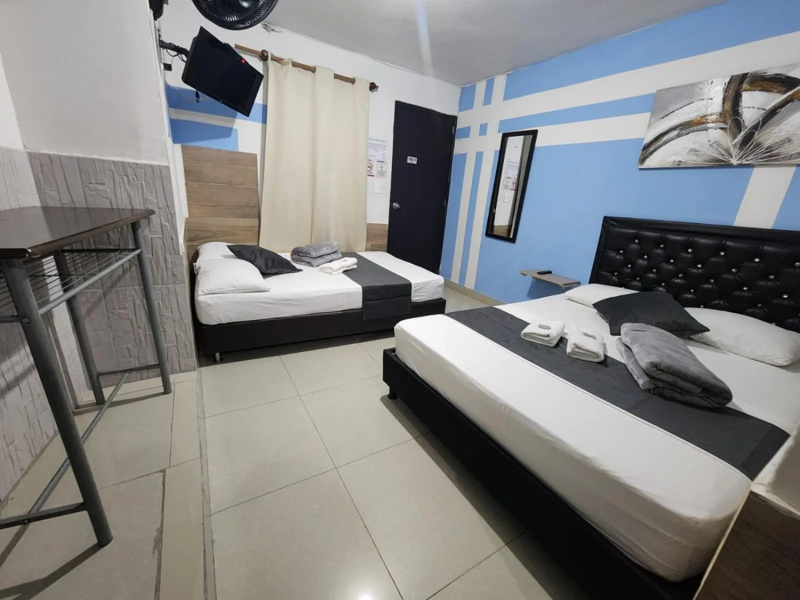 Bed in hotel medellin calasanz