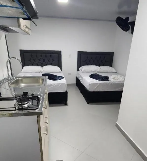 Bed in hotel medellin calasanz
