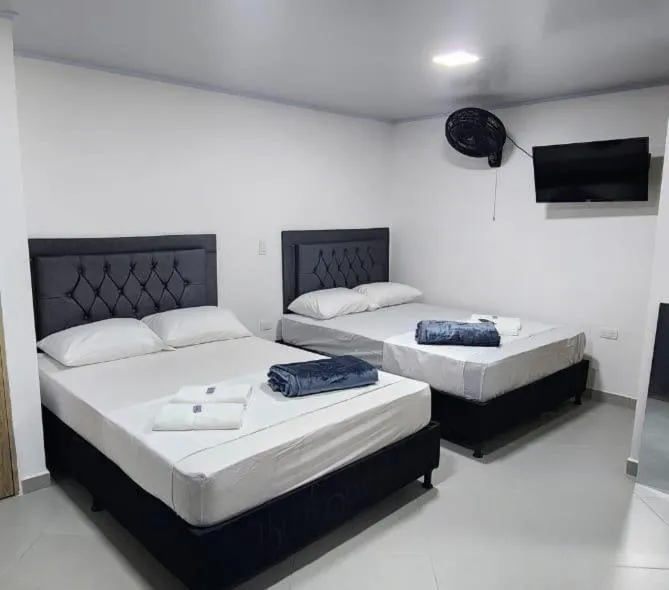 Bed in hotel medellin calasanz