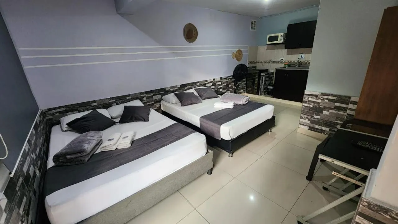 Bed in hotel medellin calasanz