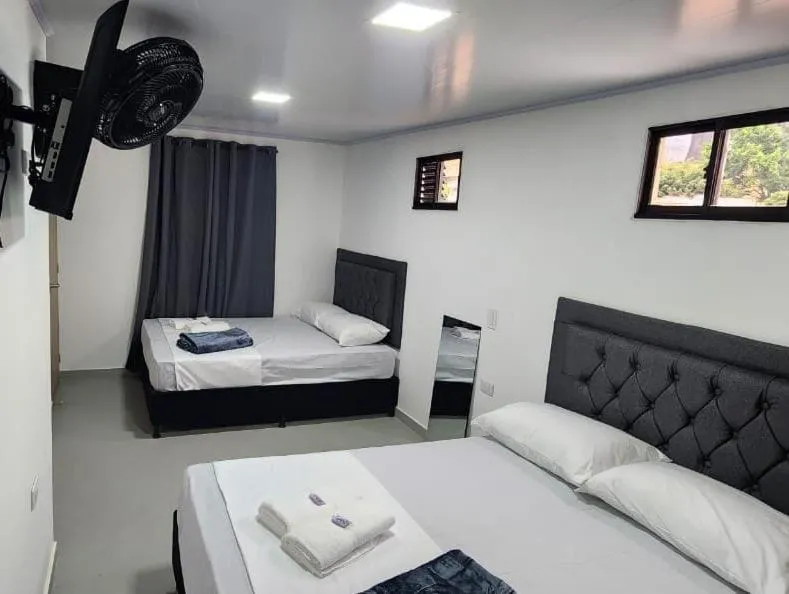 Bed in hotel medellin calasanz