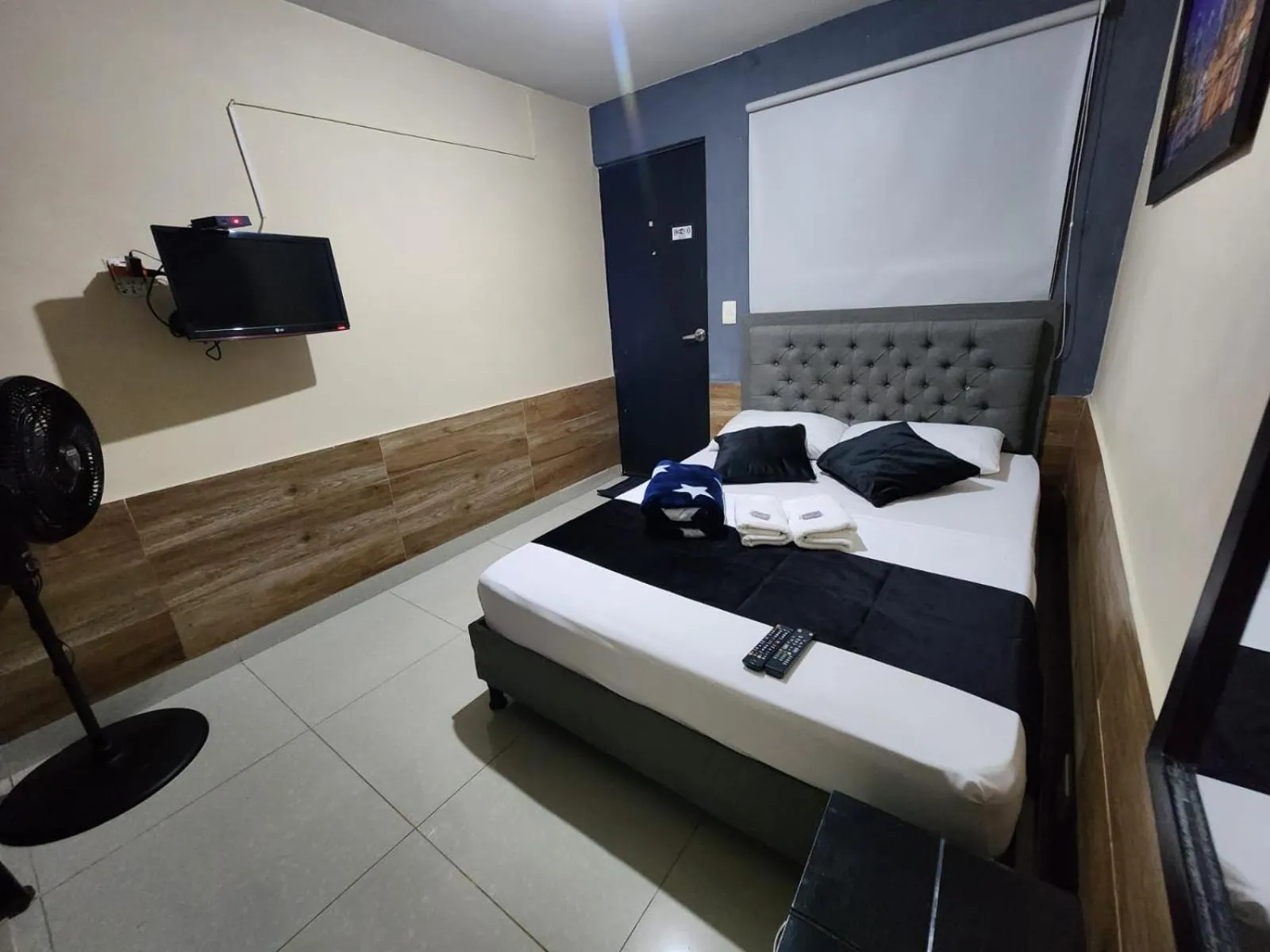 Bed in hotel medellin calasanz