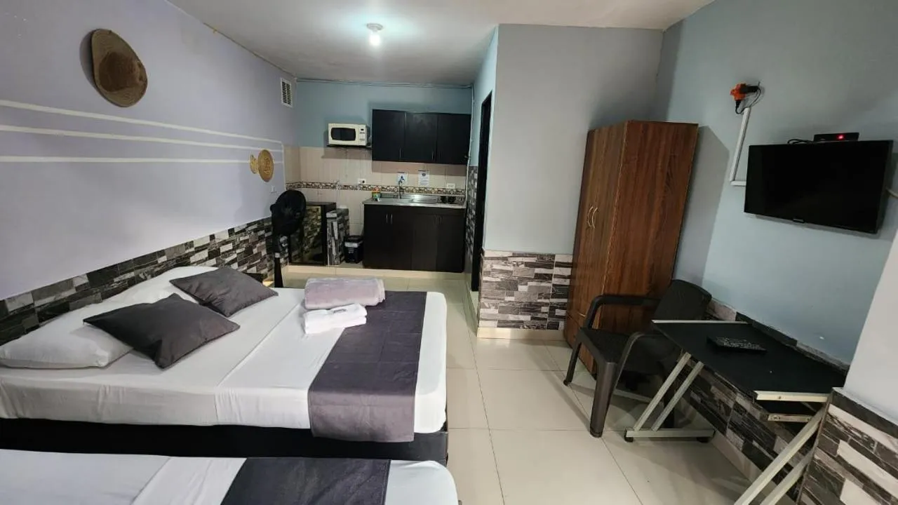 Bed in hotel medellin calasanz