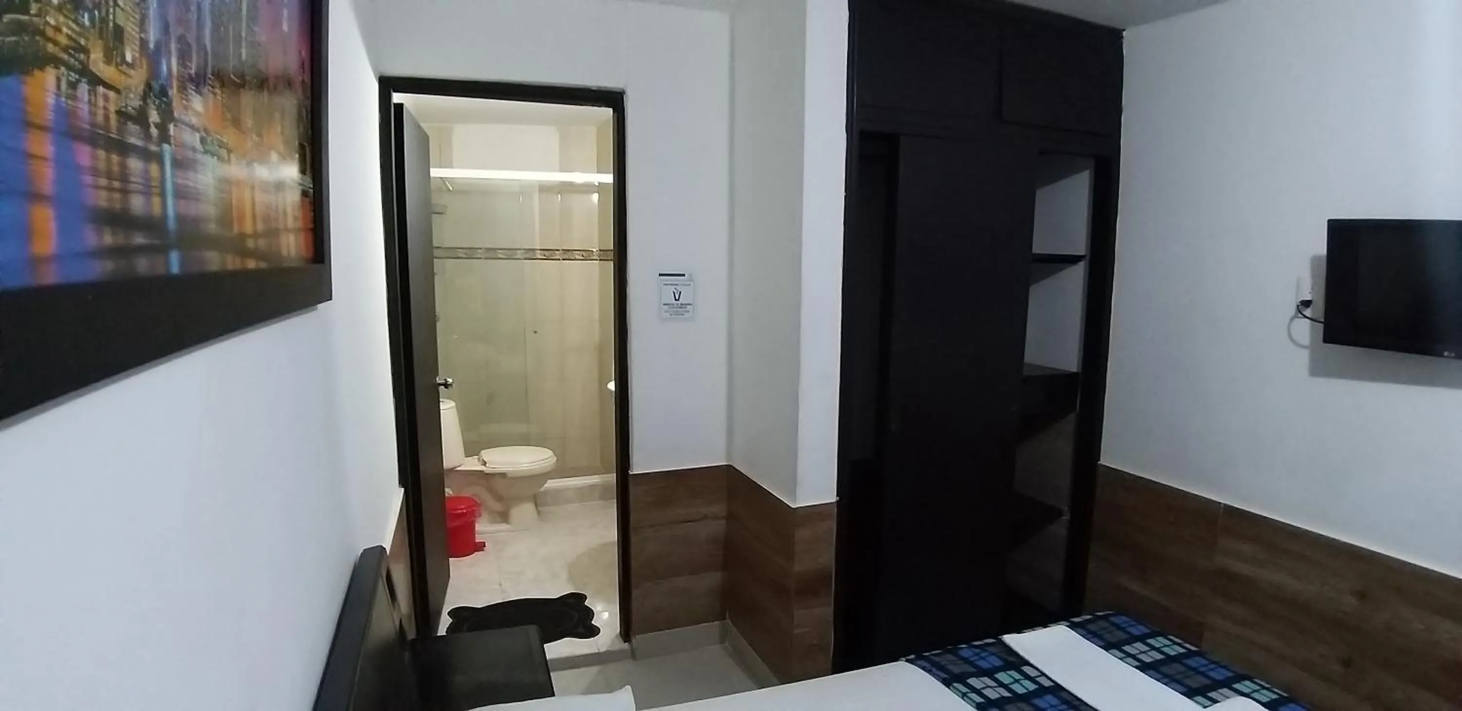 Bed in hotel medellin calasanz