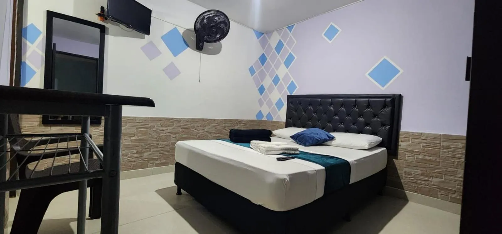 Bed in hotel medellin calasanz