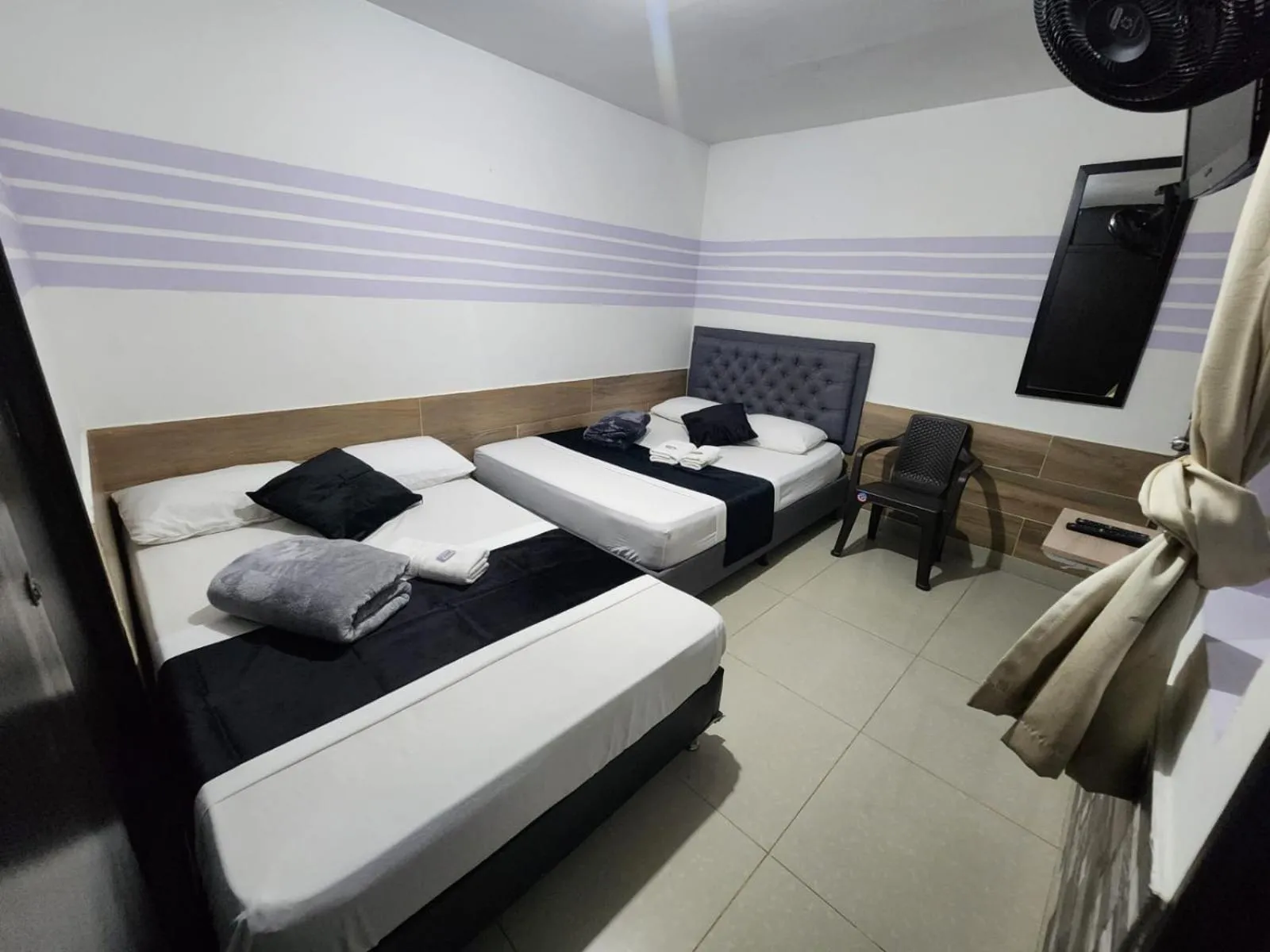 Bed in hotel medellin calasanz