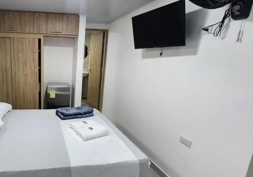 Bed in hotel medellin calasanz