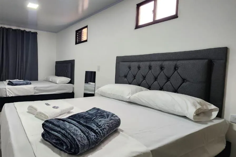 Bed in hotel medellin calasanz