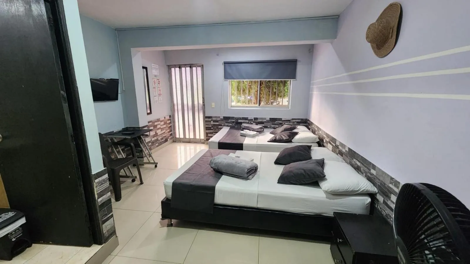 Bed in hotel medellin calasanz