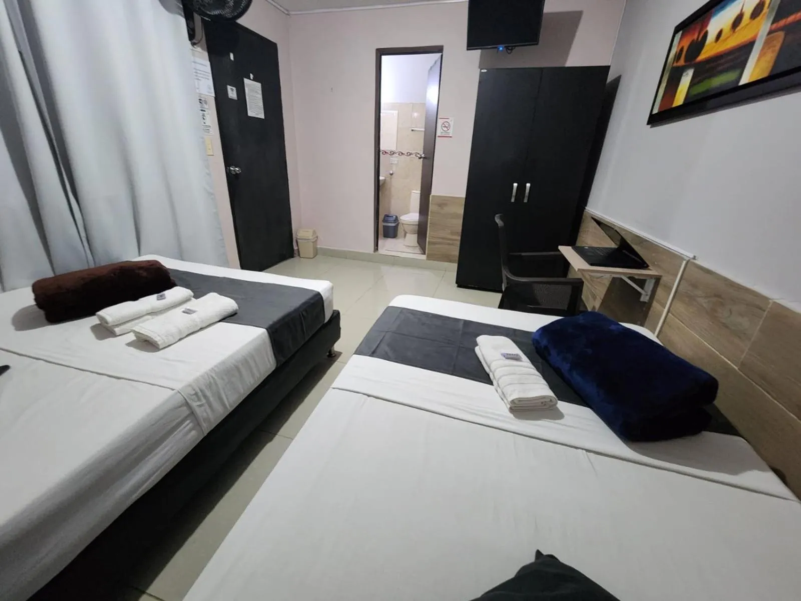Bed in hotel medellin calasanz