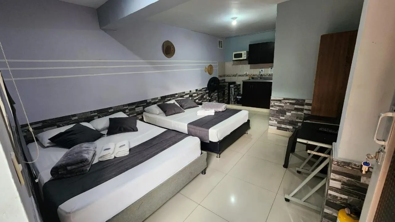 Bed in hotel medellin calasanz
