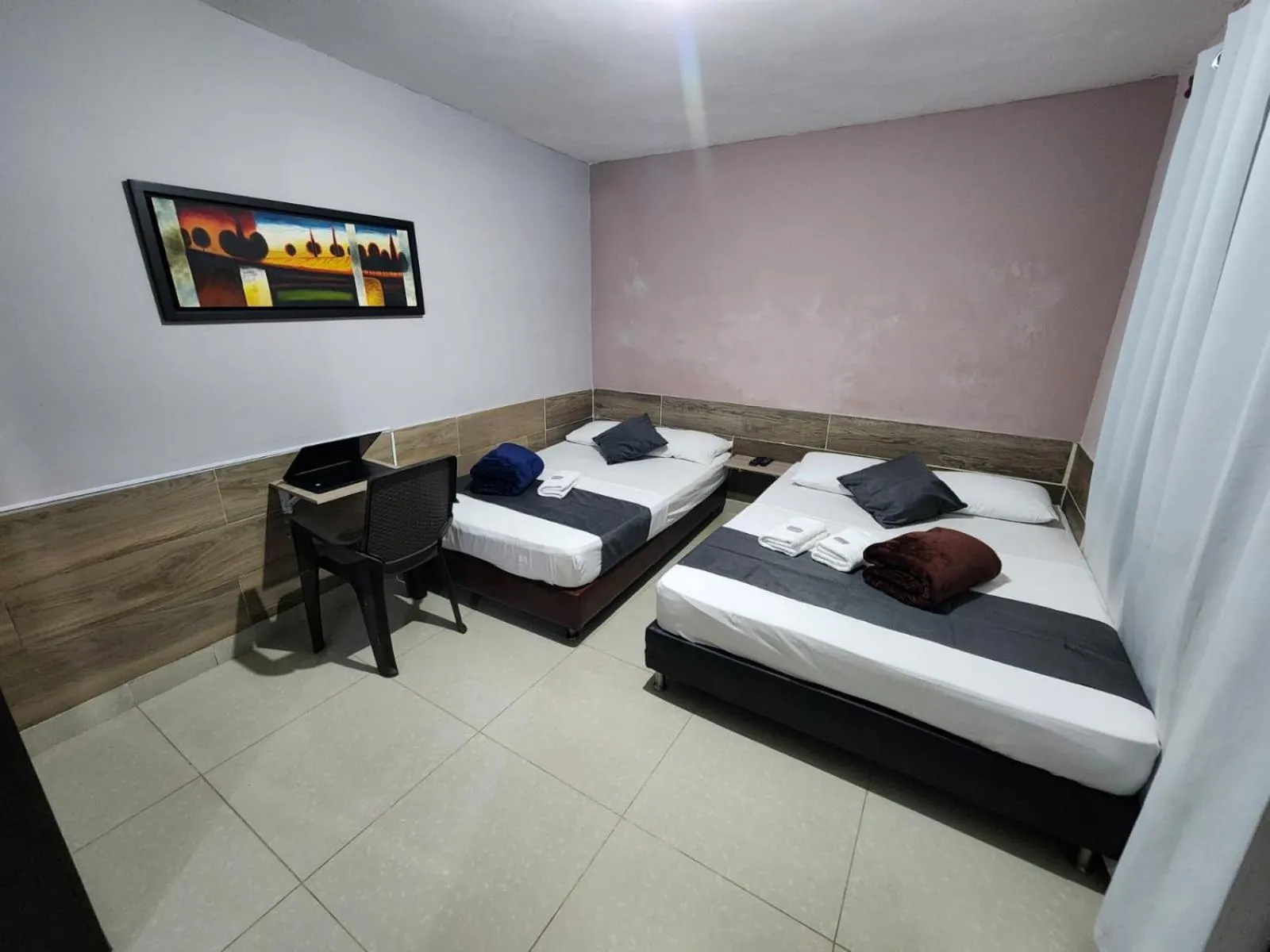 Bed in hotel medellin calasanz