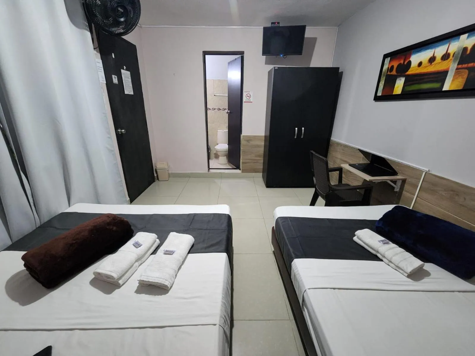 Bed in hotel medellin calasanz