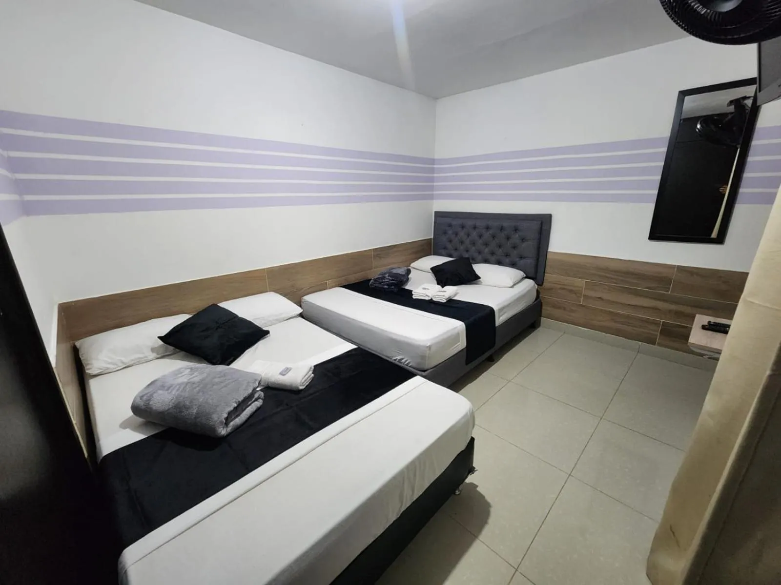 Bed in hotel medellin calasanz