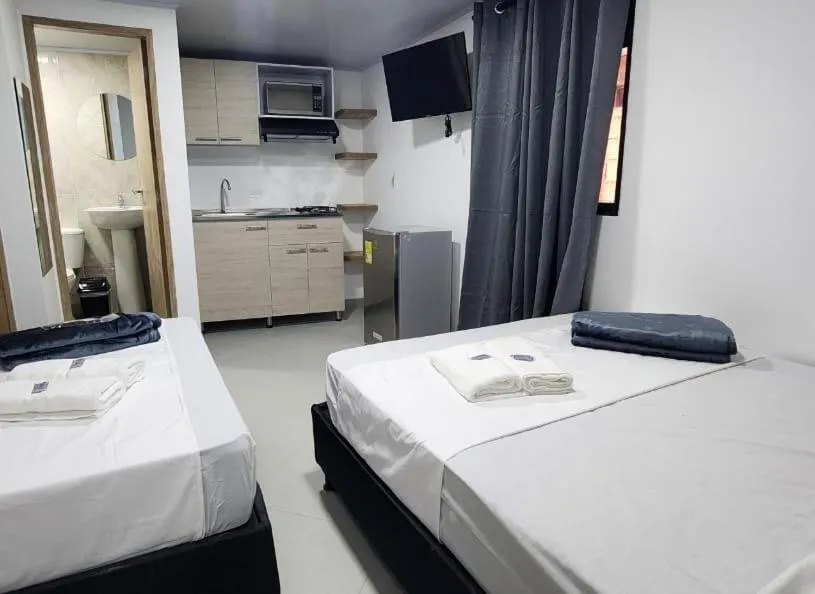 Bed in hotel medellin calasanz
