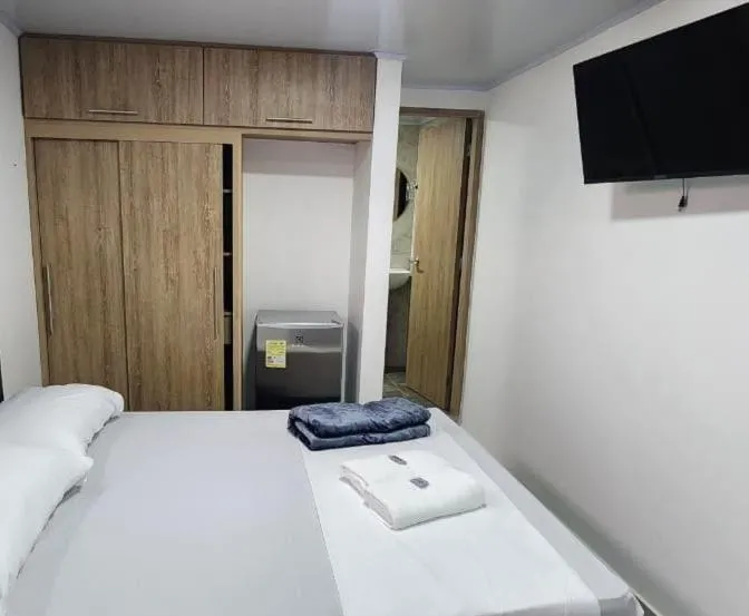 Bed in hotel medellin calasanz