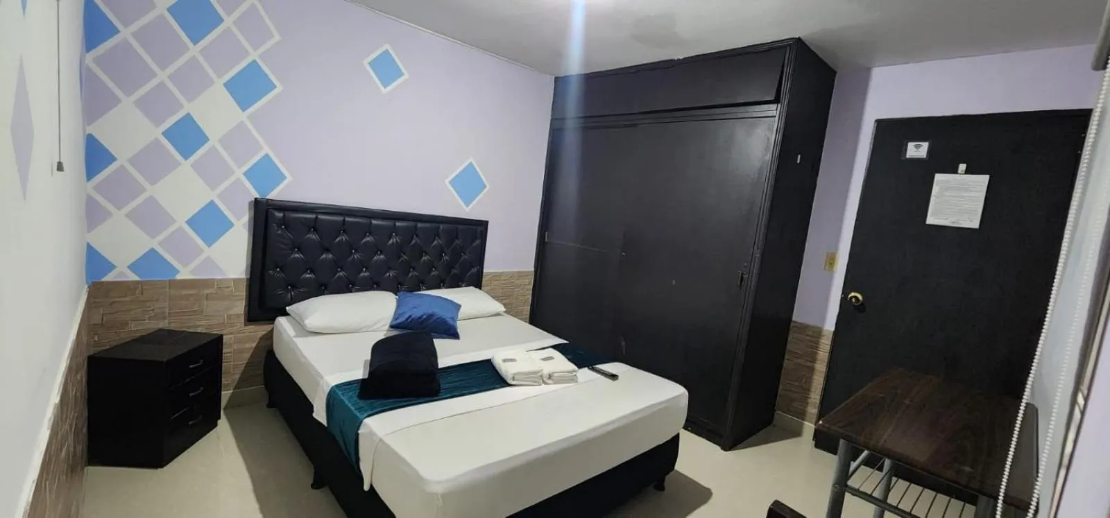 Bed in hotel medellin calasanz