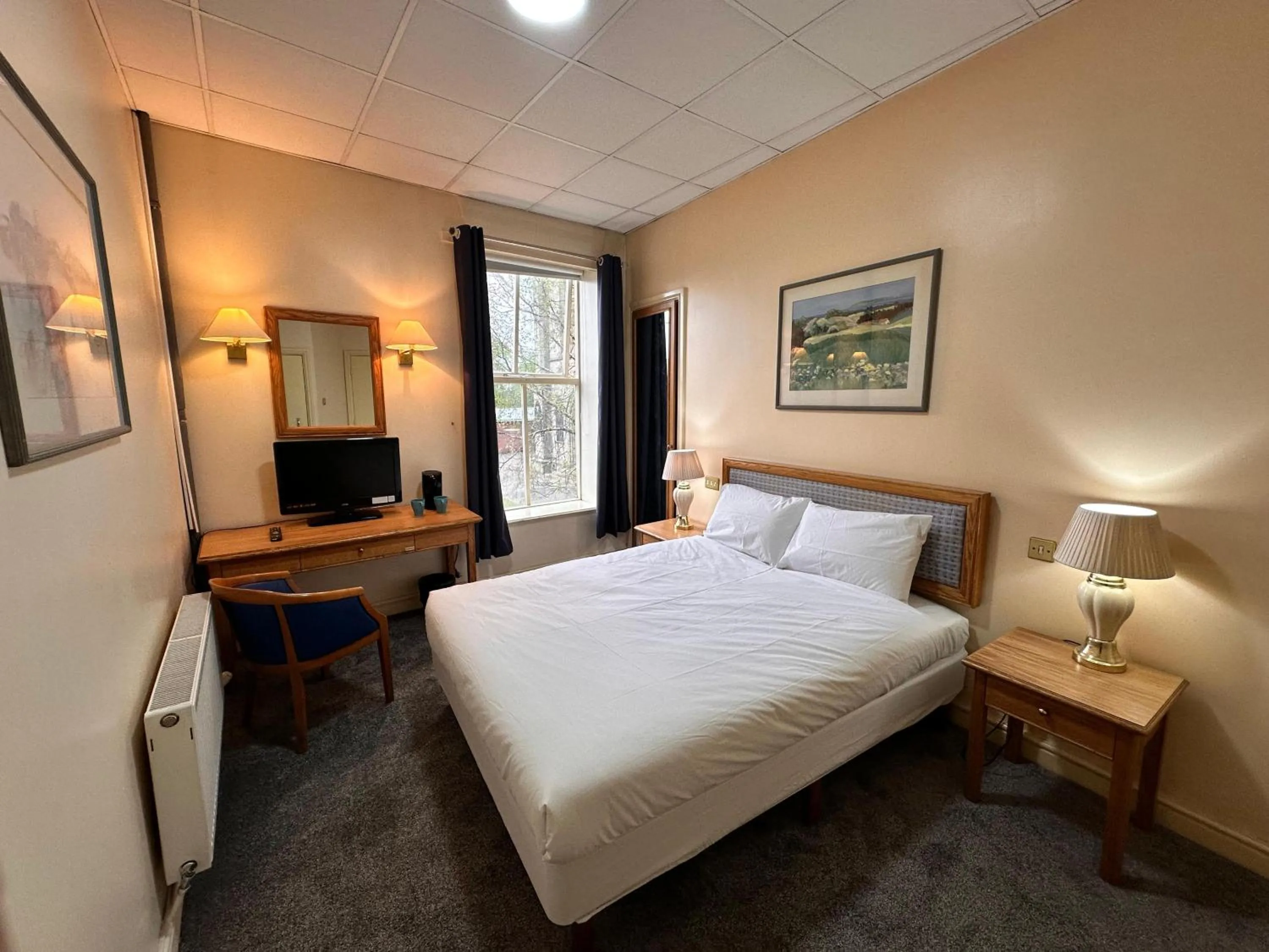 Bed in Throstles Nest Hotel