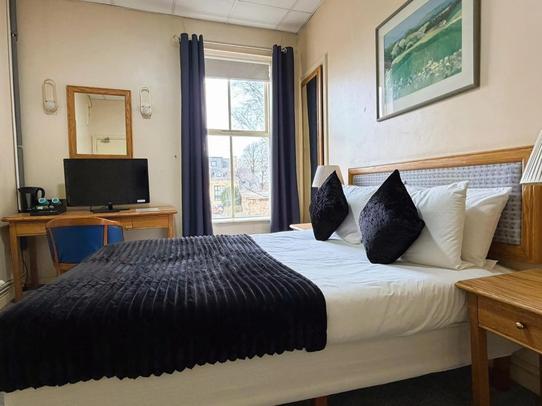 Bed in Throstles Nest Hotel