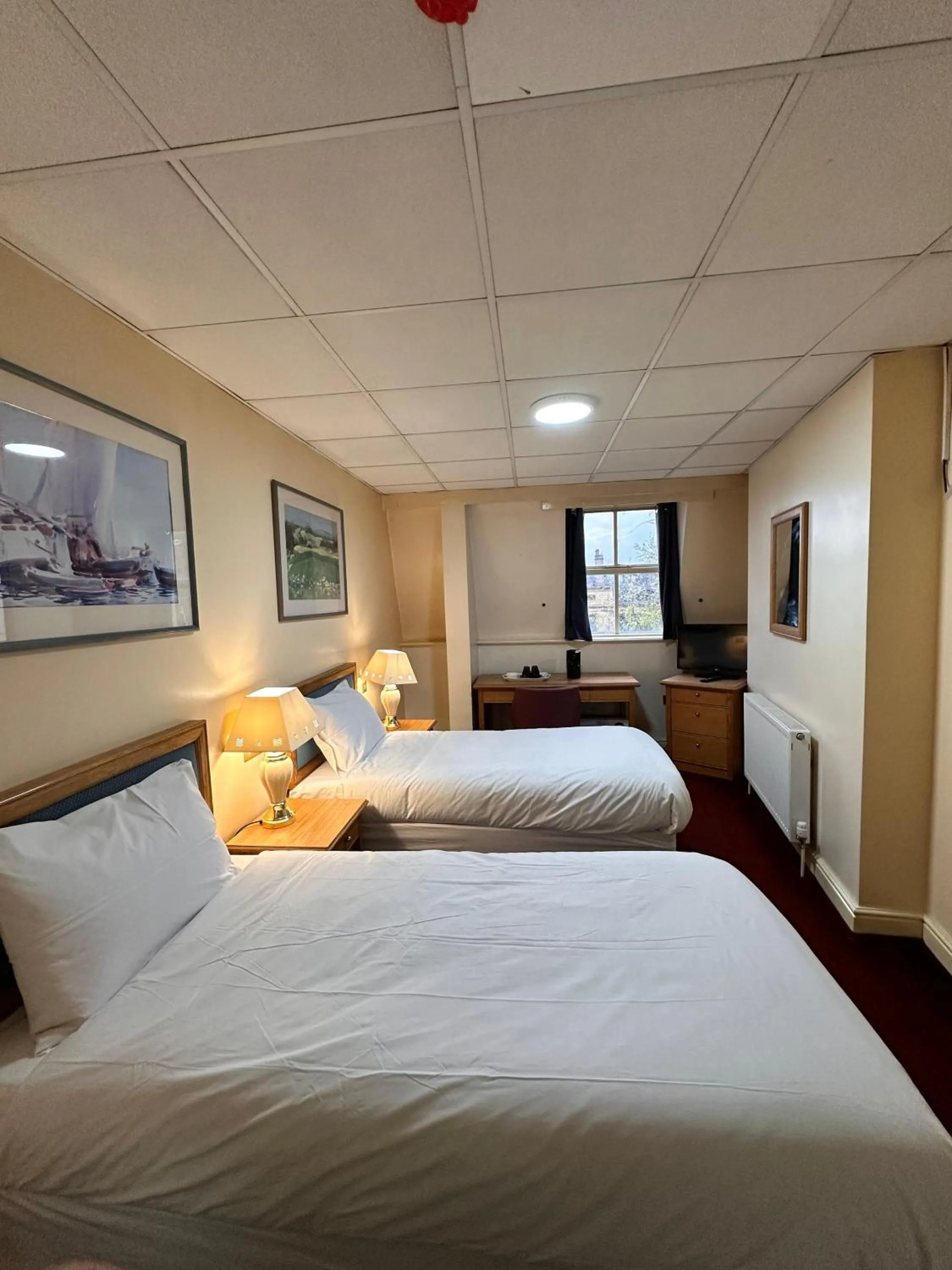 Bed in Throstles Nest Hotel