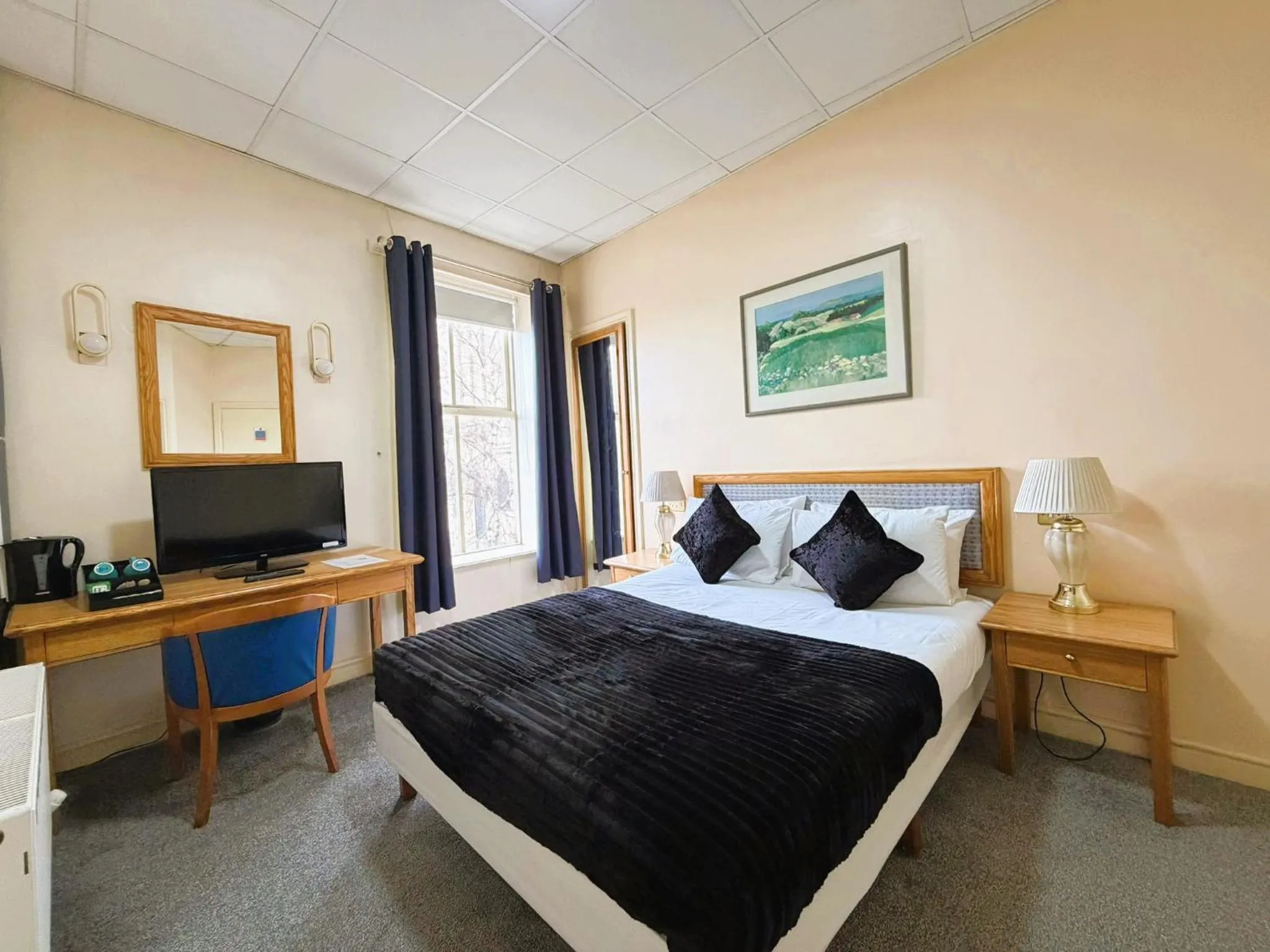 Bed in Throstles Nest Hotel