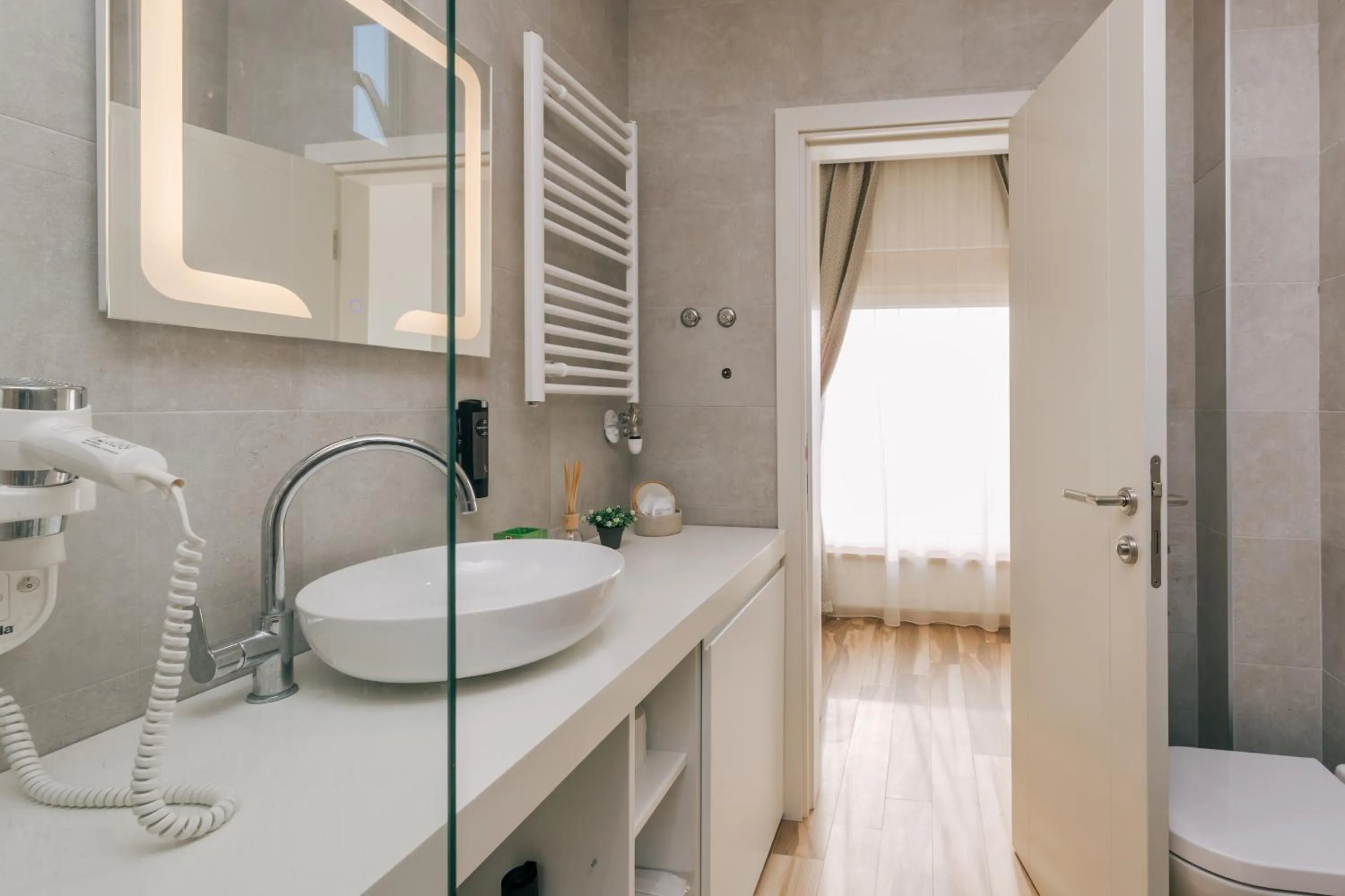 Toilet in Villa Royal Apartments