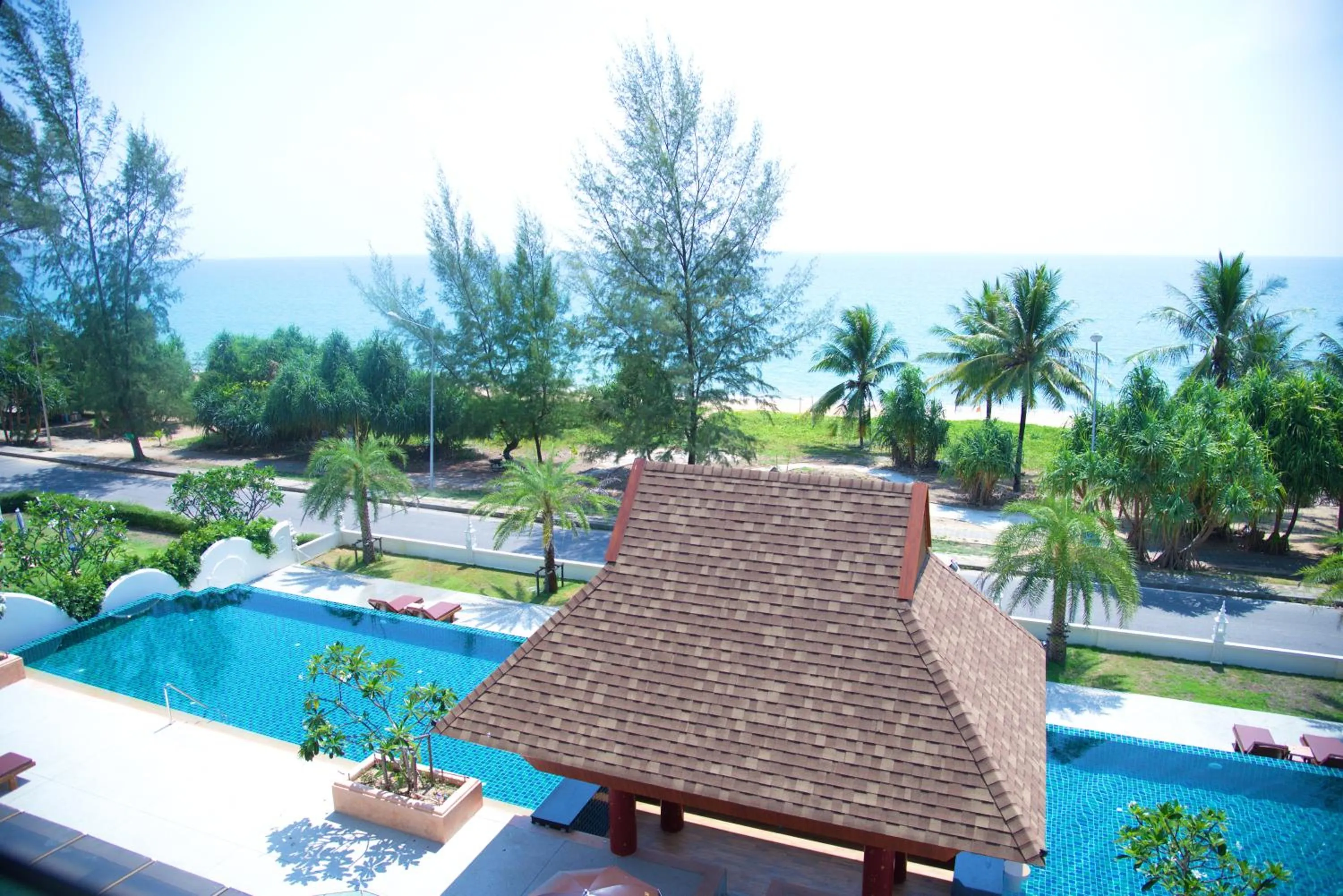 Swimming pool in Maikhao Palm Beach Resort - SHA Plus