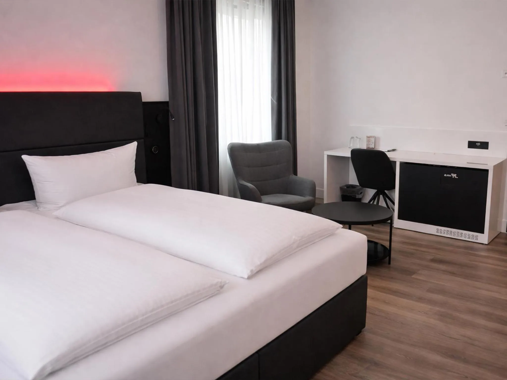 Photo of the whole room, Bed in DORMERO Hotel Coburg