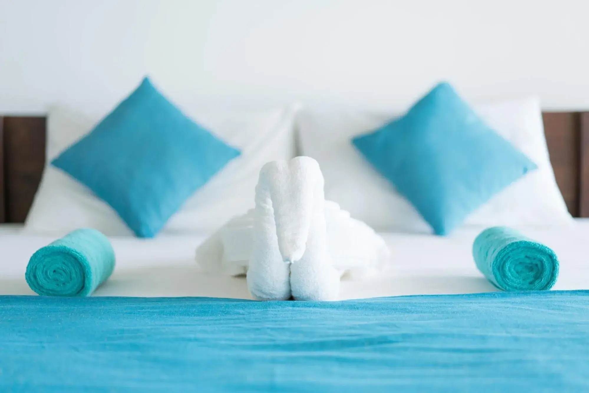 Bed in At Ease Beach Hotel Bed in At Ease Beach Hotel