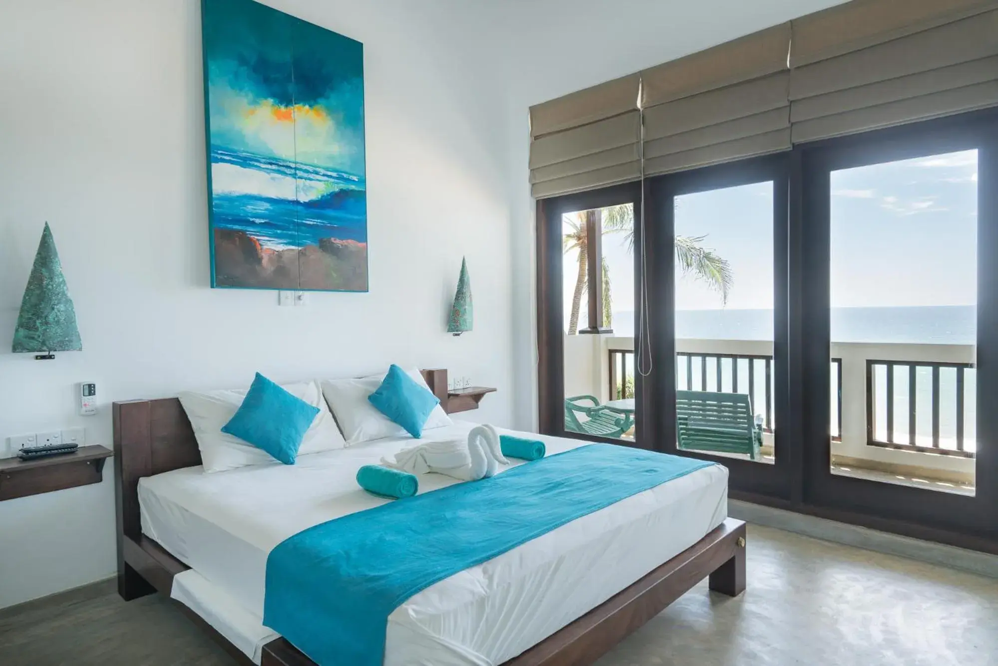 Bed in At Ease Beach Hotel Bed in At Ease Beach Hotel