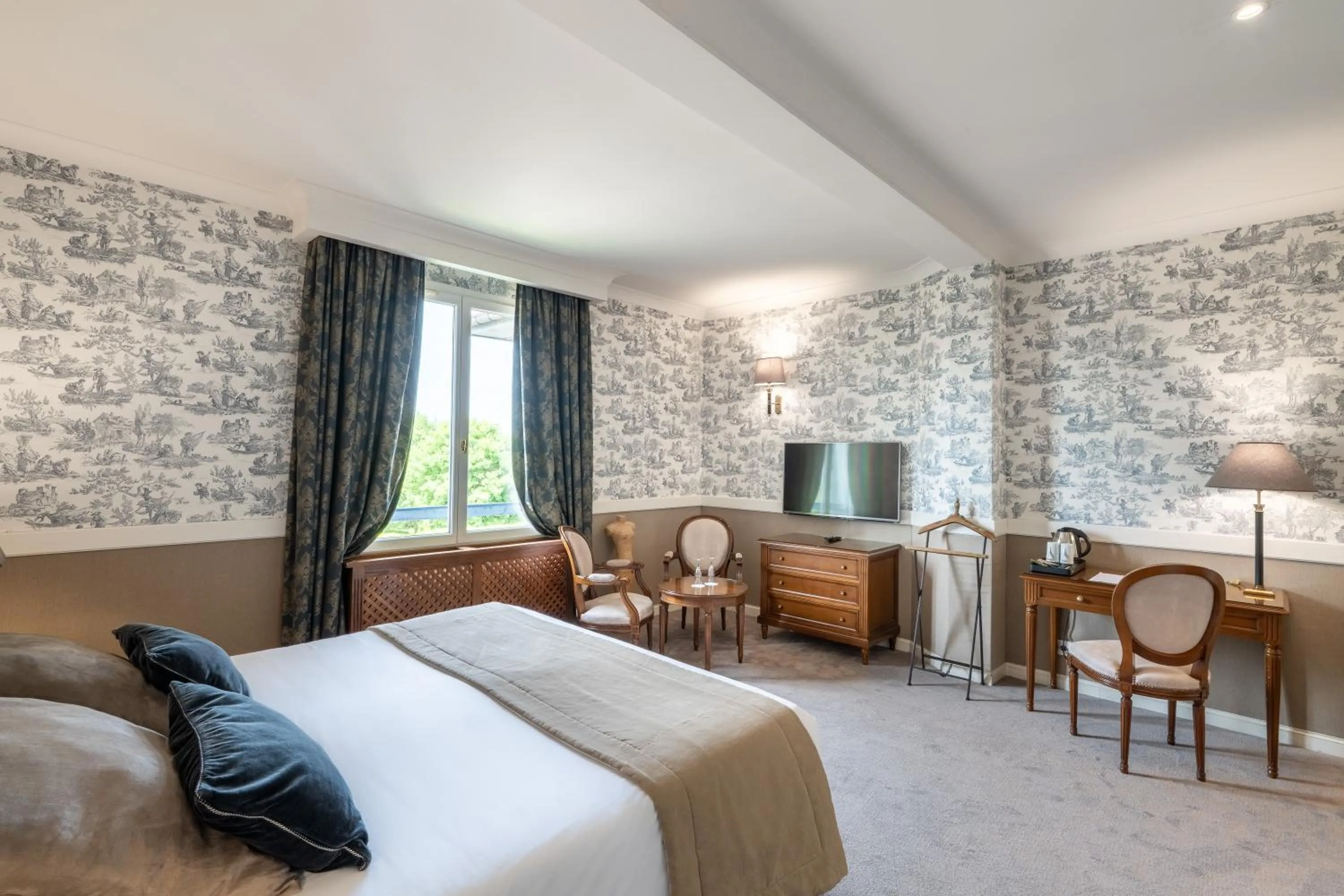 Bed in Le Manoir De La Poterie & Spa