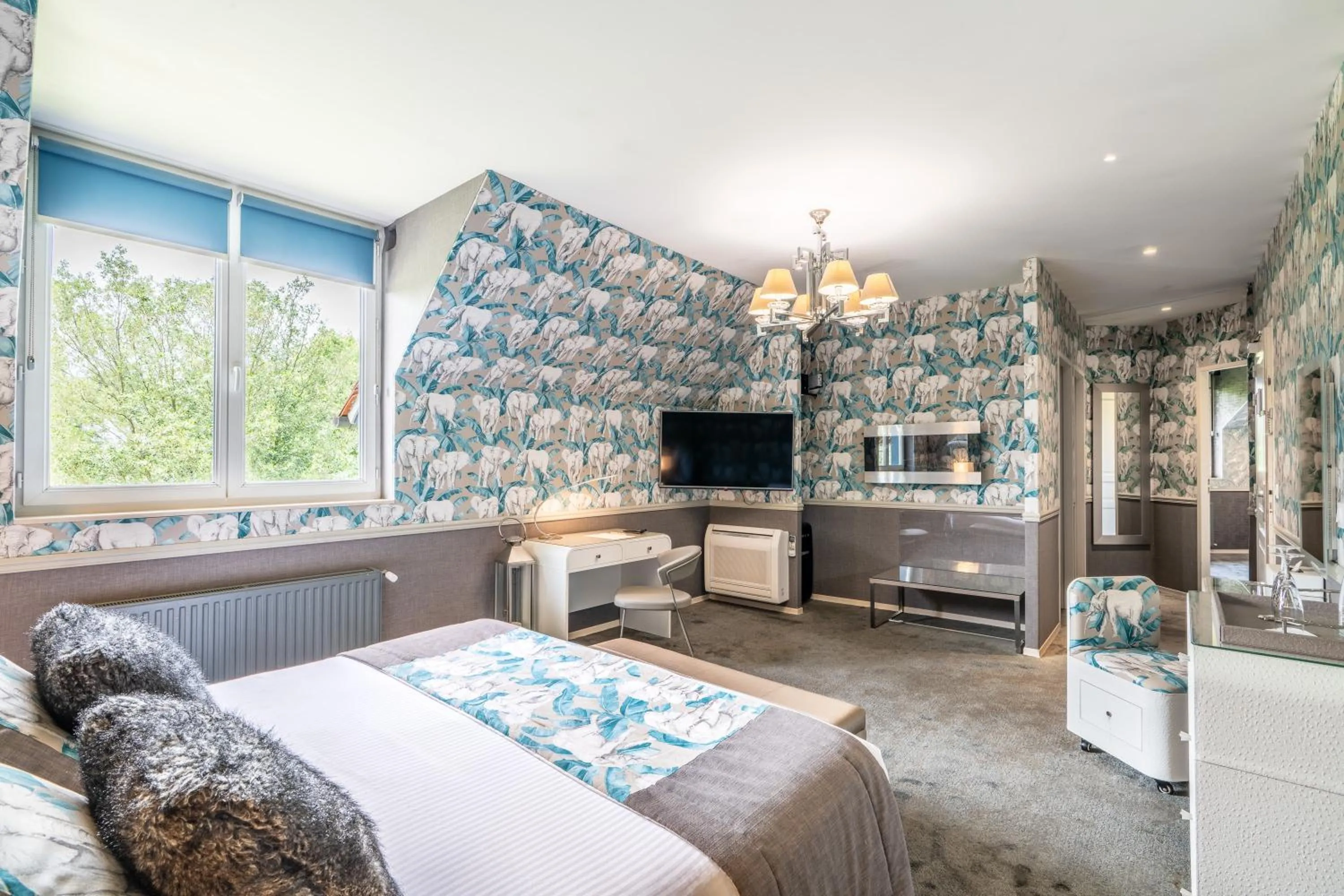 Bed in Le Manoir De La Poterie & Spa