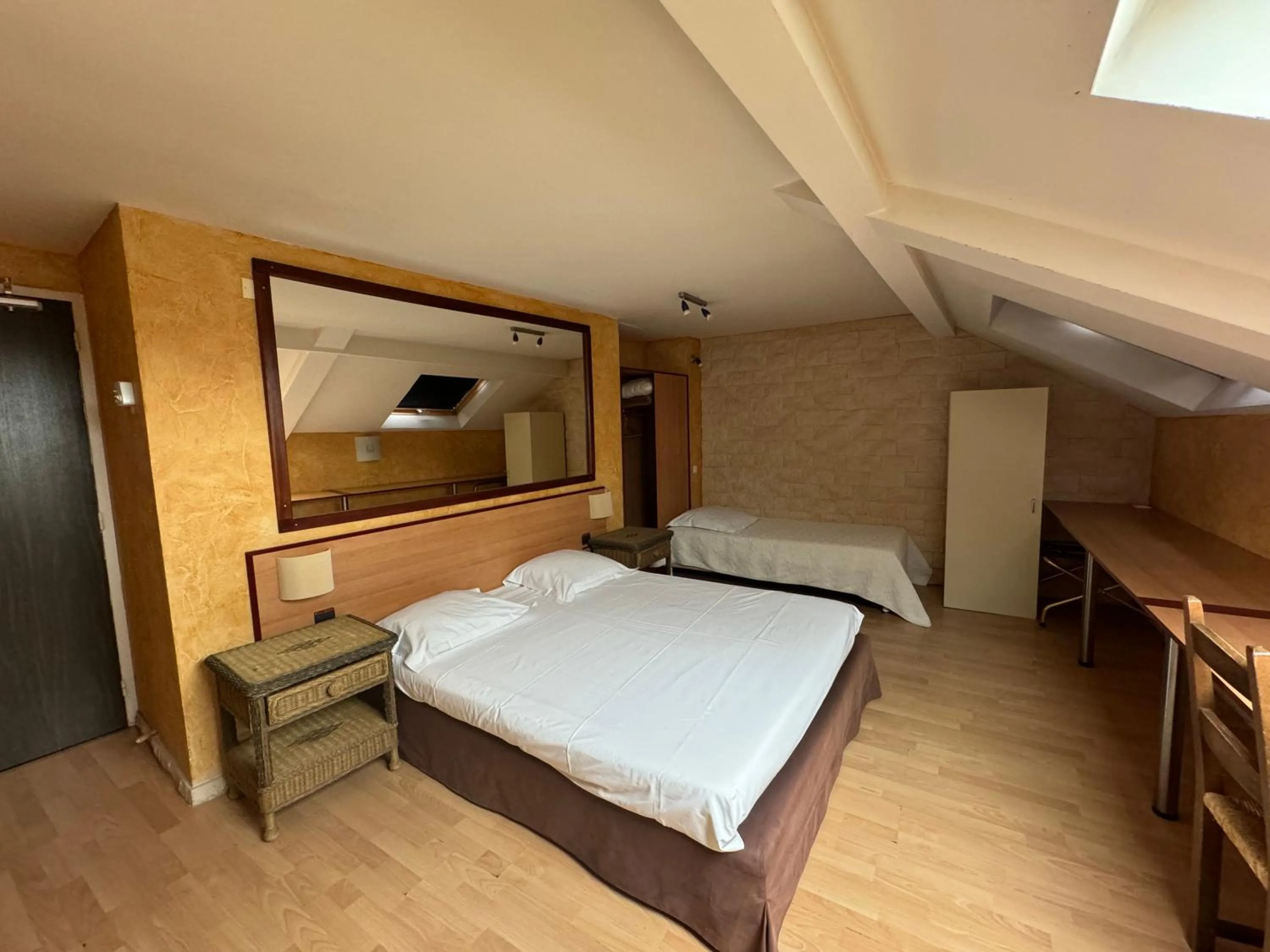 Photo of the whole room, Bed in Hôtel Bosquet Pau Centre - Self Check In Budget Hotel