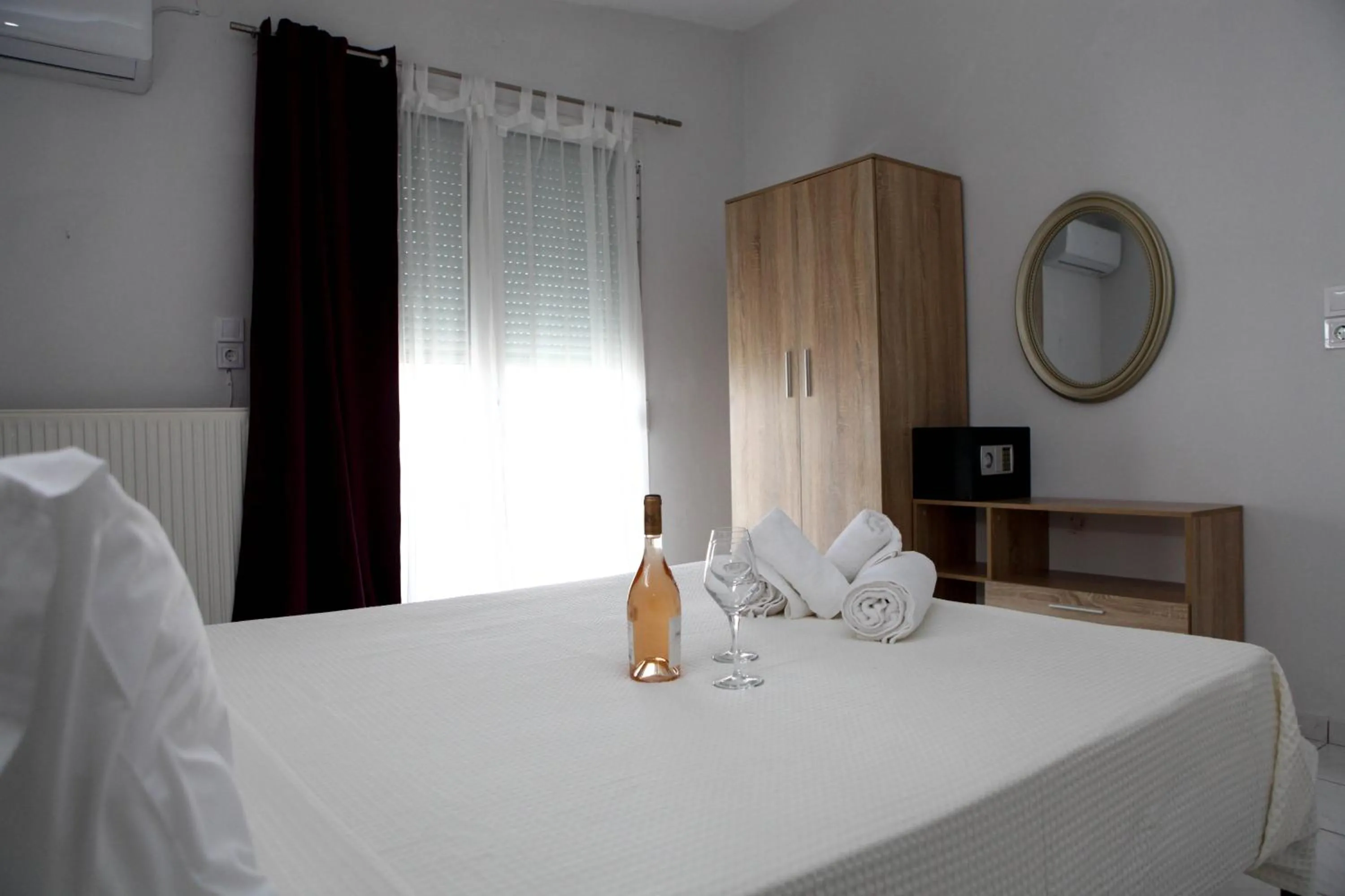 Bed in Nicole Fresh Apartments