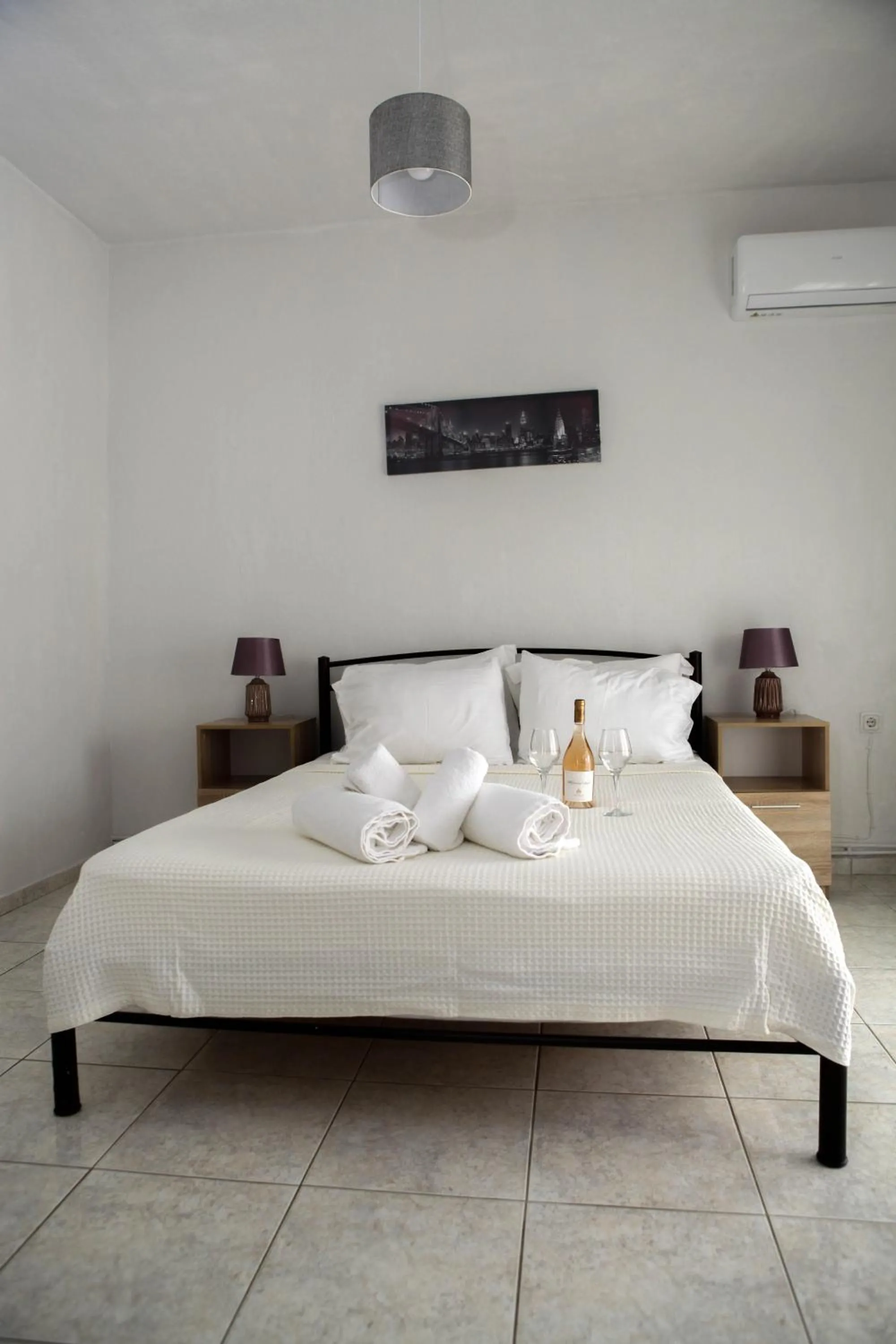 Bed in Nicole Fresh Apartments