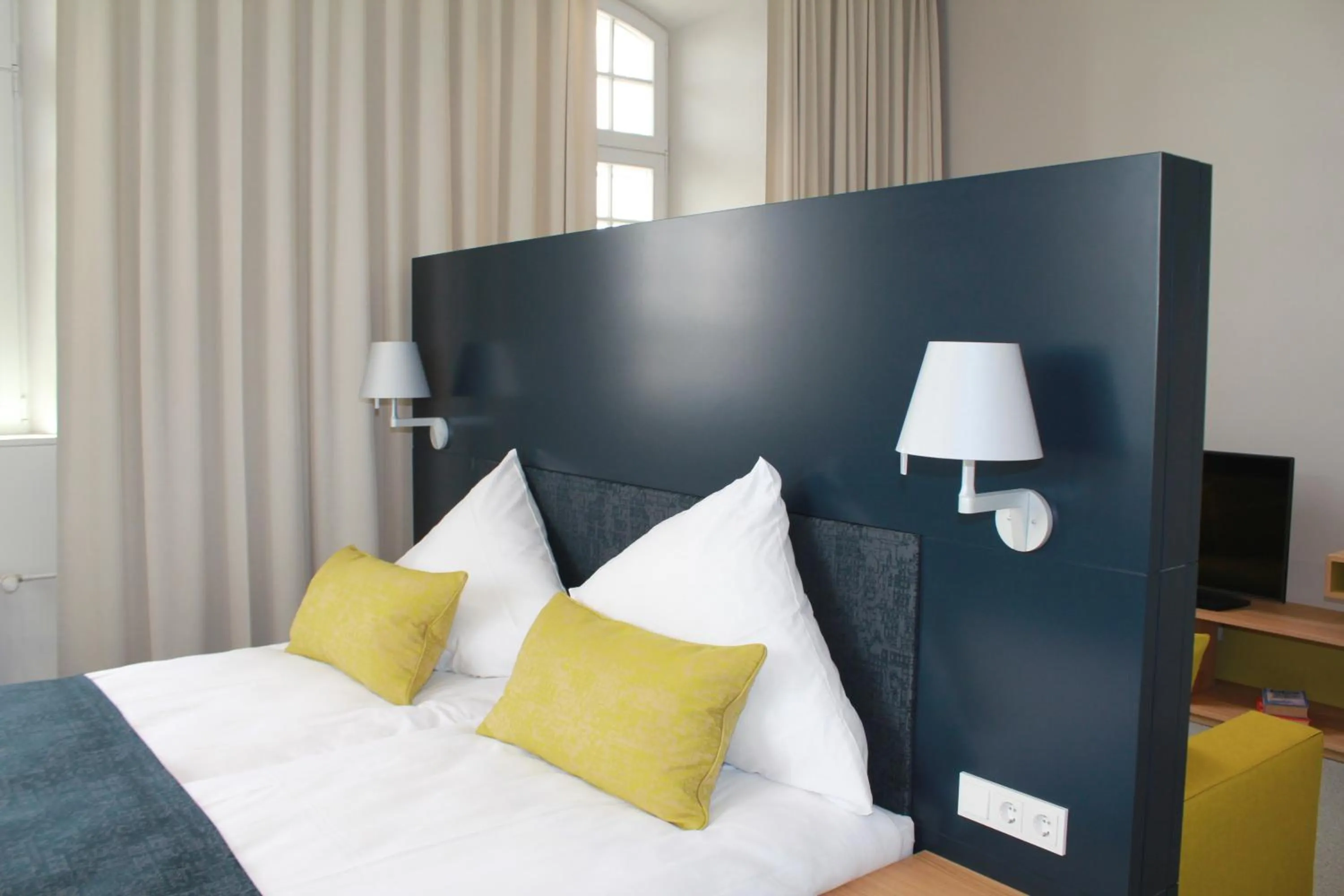 Photo of the whole room, Bed in Katholisch-Soziales Institut