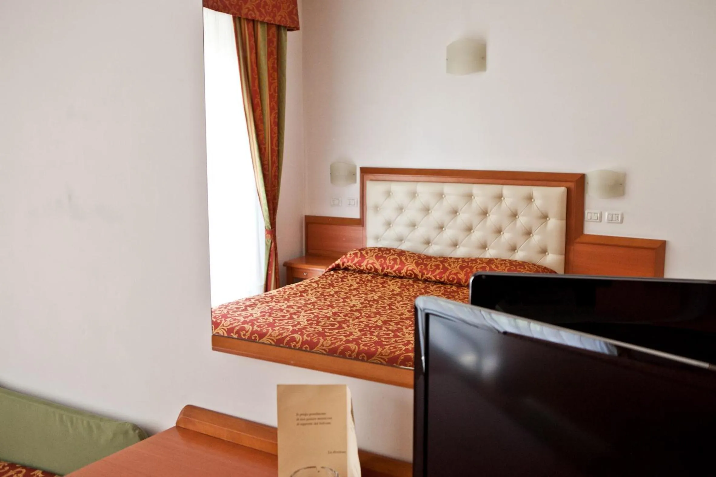 Bed in Hotel Gabbiano