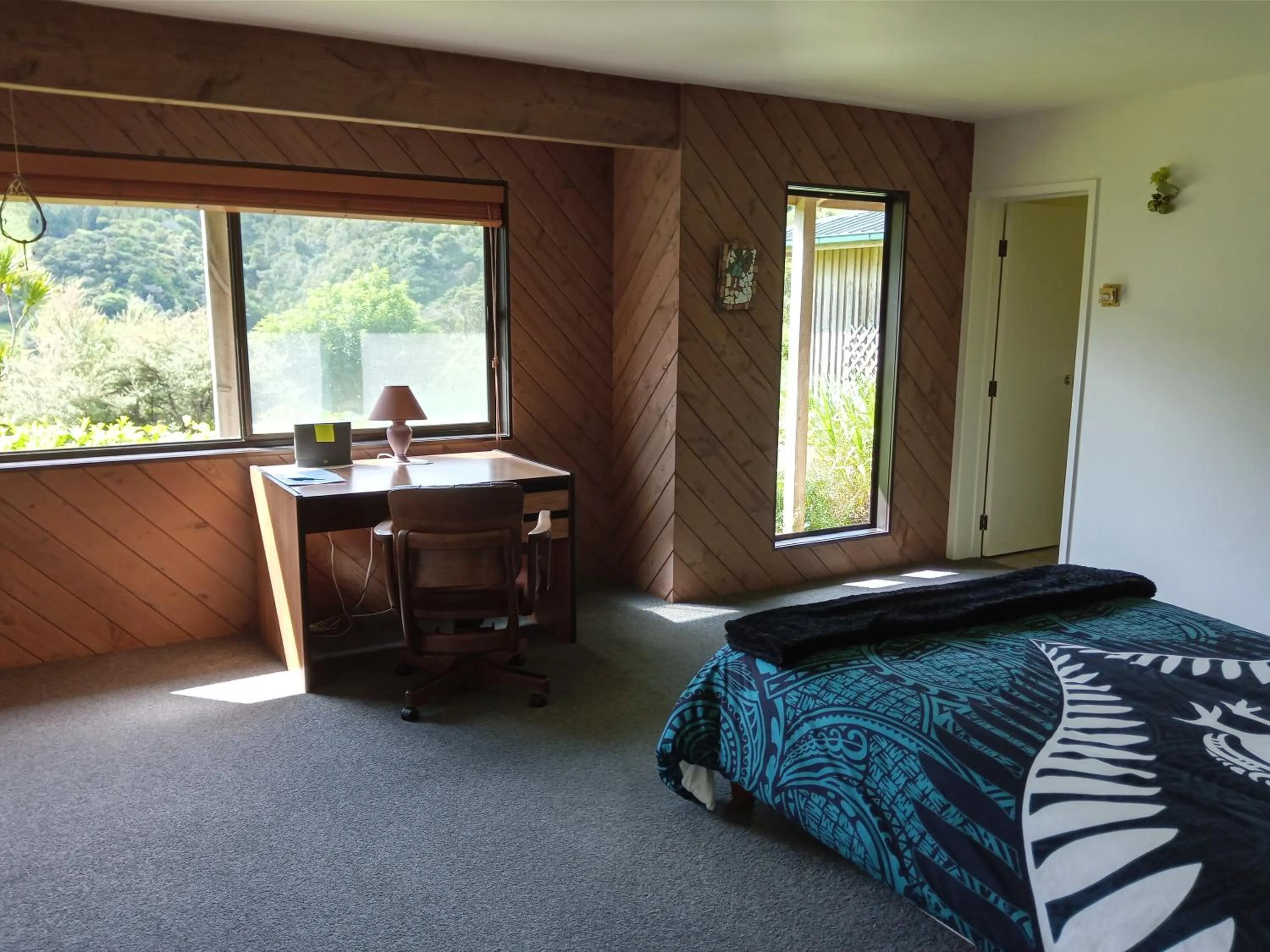 Bed in Waiotemarama Falls Lodge