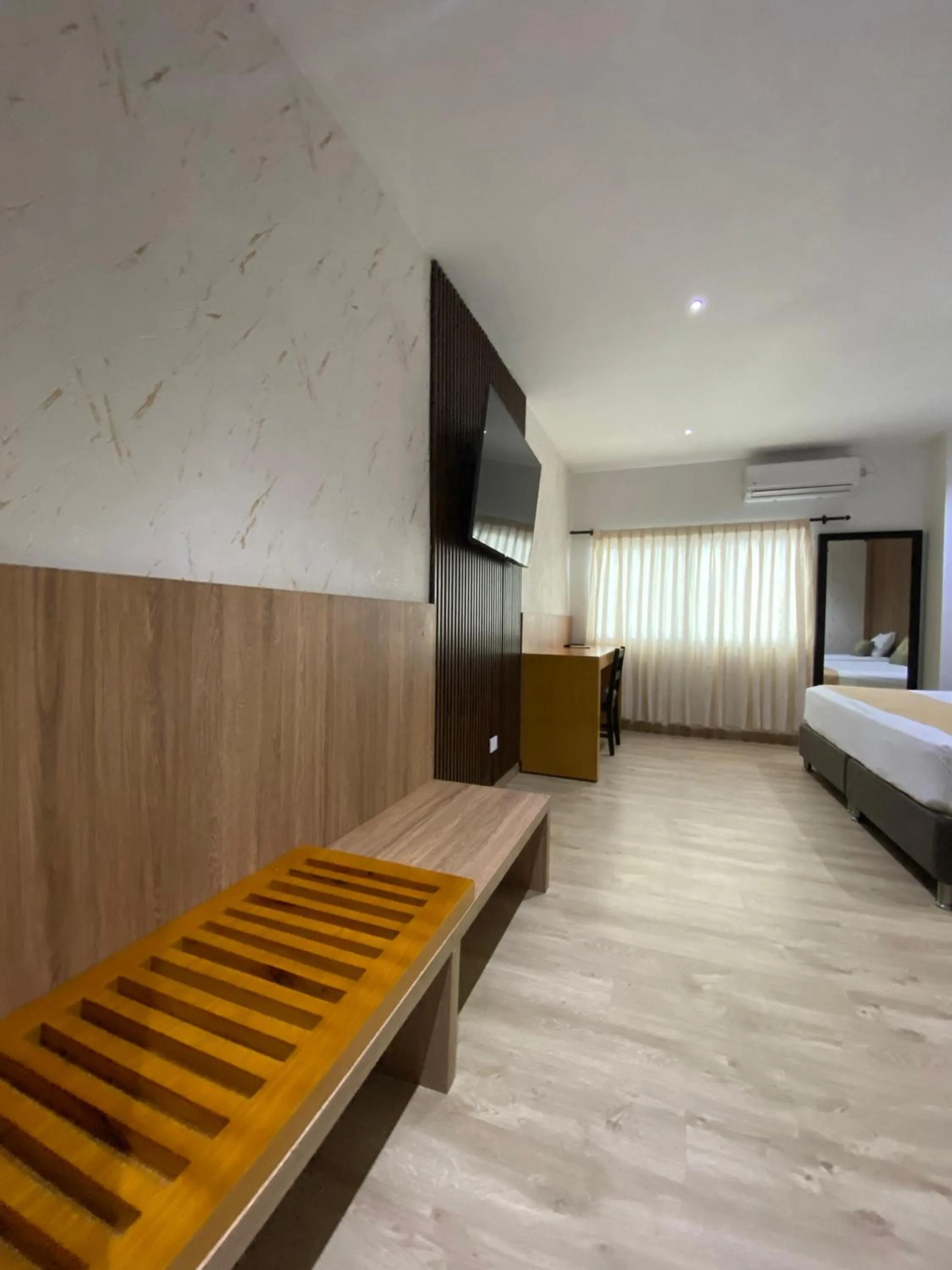 Seating area, Bed in Hotel Portofino