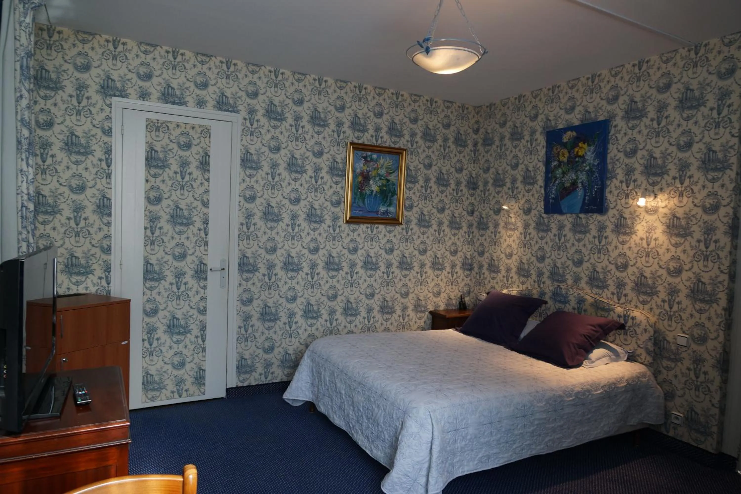 Bed in Hotel La Diligence