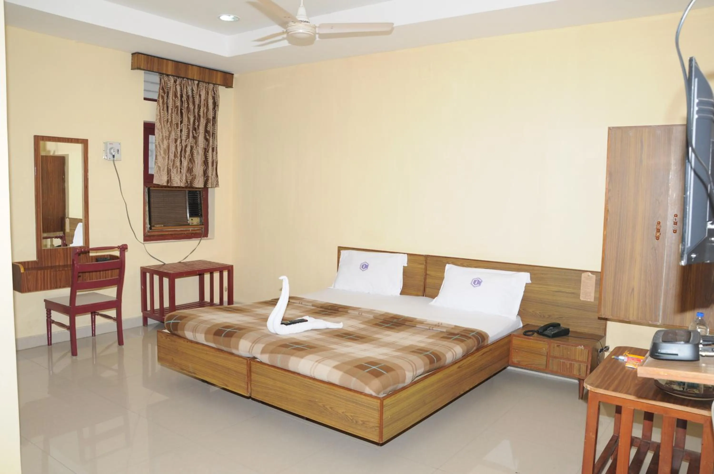 Living room, Bed in Hotel Chanma International